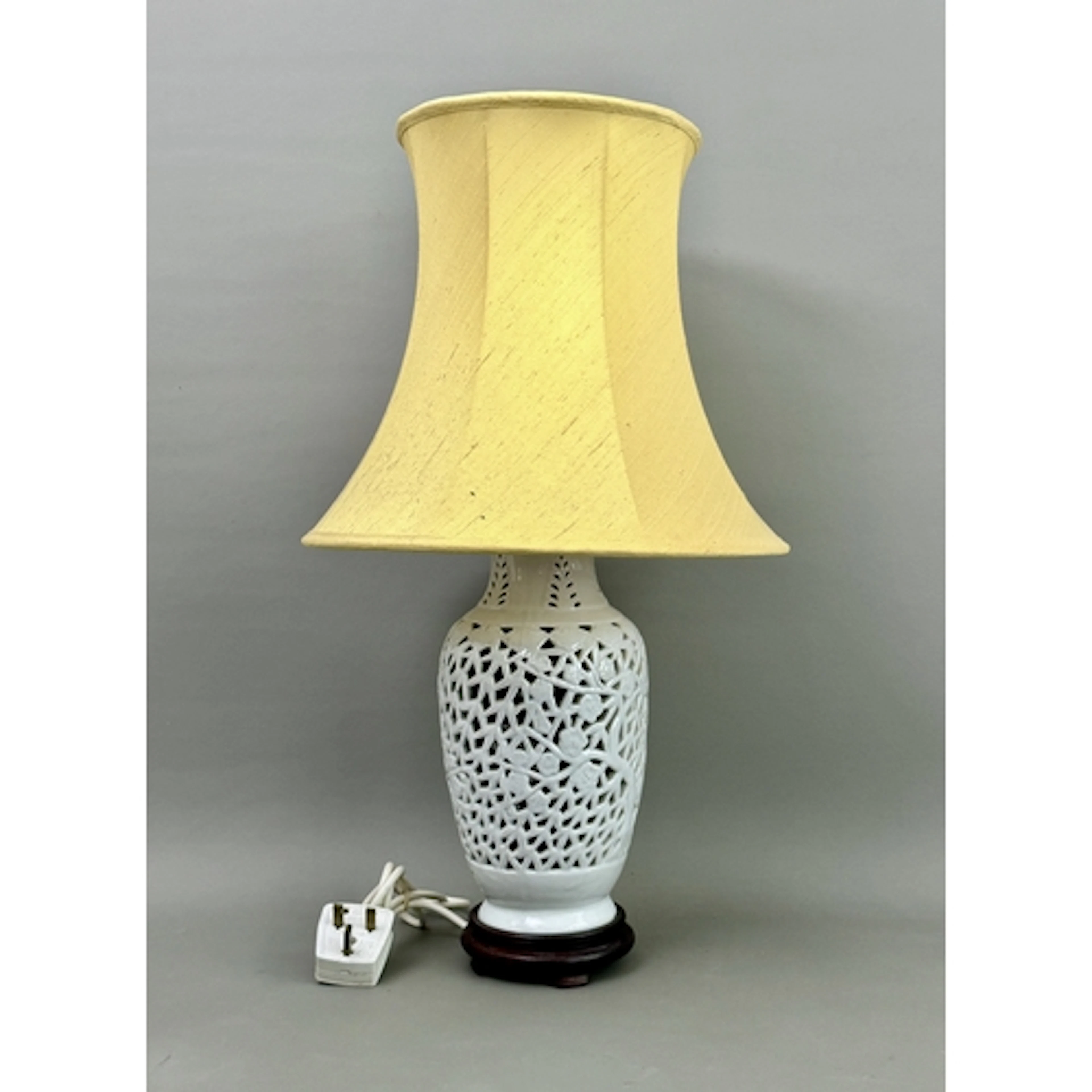 A Chinese blanc de chine reticulated vase based lamp - the b...