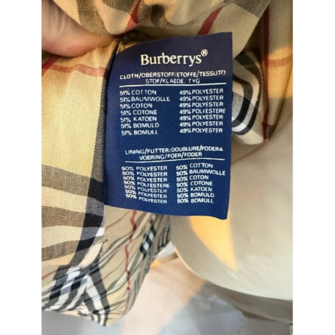 A Burberrys lady's iconic trench coat in honey beige, size 1...