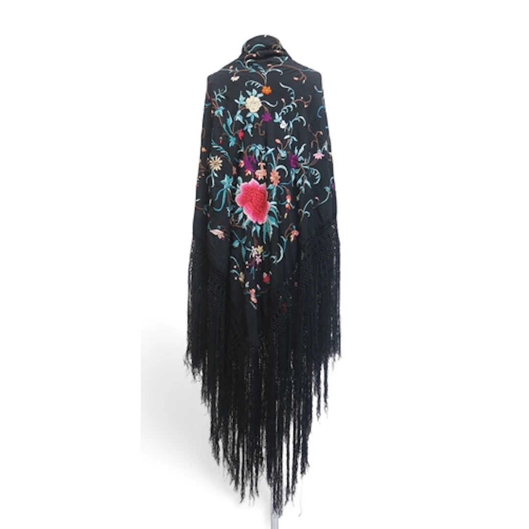 A Canton piano shawl embroidered with peonies and meandering...
