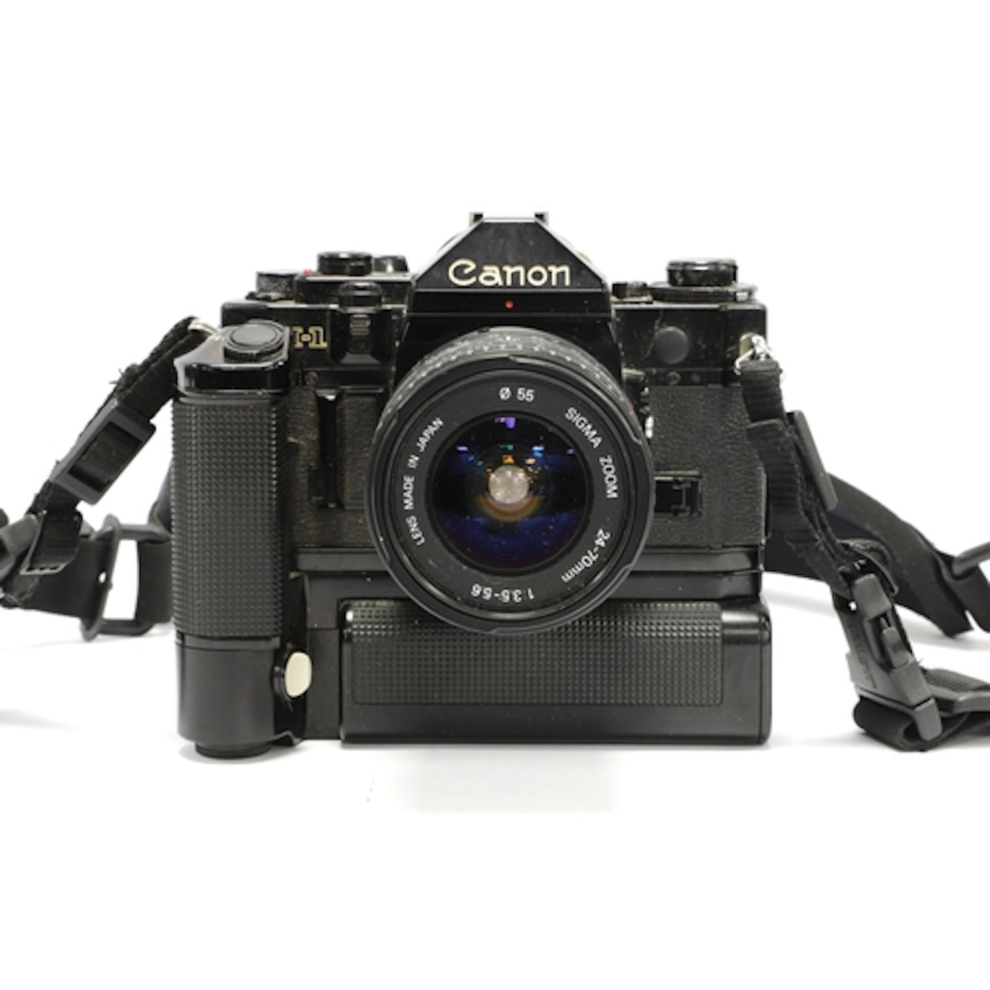 Canon A-1 35mm SLR Film Camera with attached Sigma Zoom 24-7...