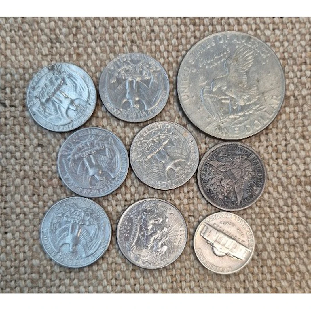 A group of assorted American silver coins to include an 1896...