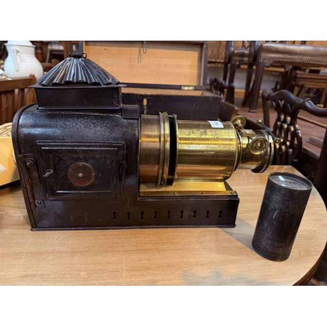 A Victorian Eclipse Magic Lantern by R R Beard, black japann...