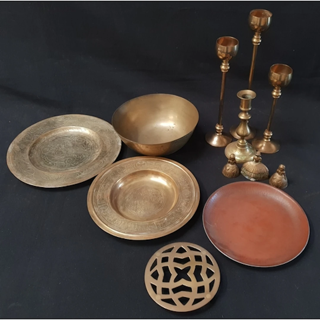 SELECTION OF BRASS AND COPPER WARE including three graduated...