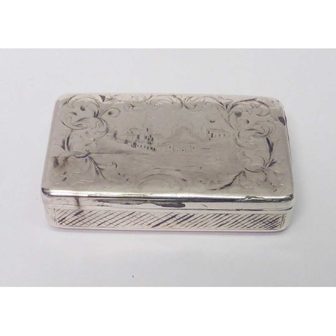 A mid-nineteenth century Russian snuff box engraved with lan...