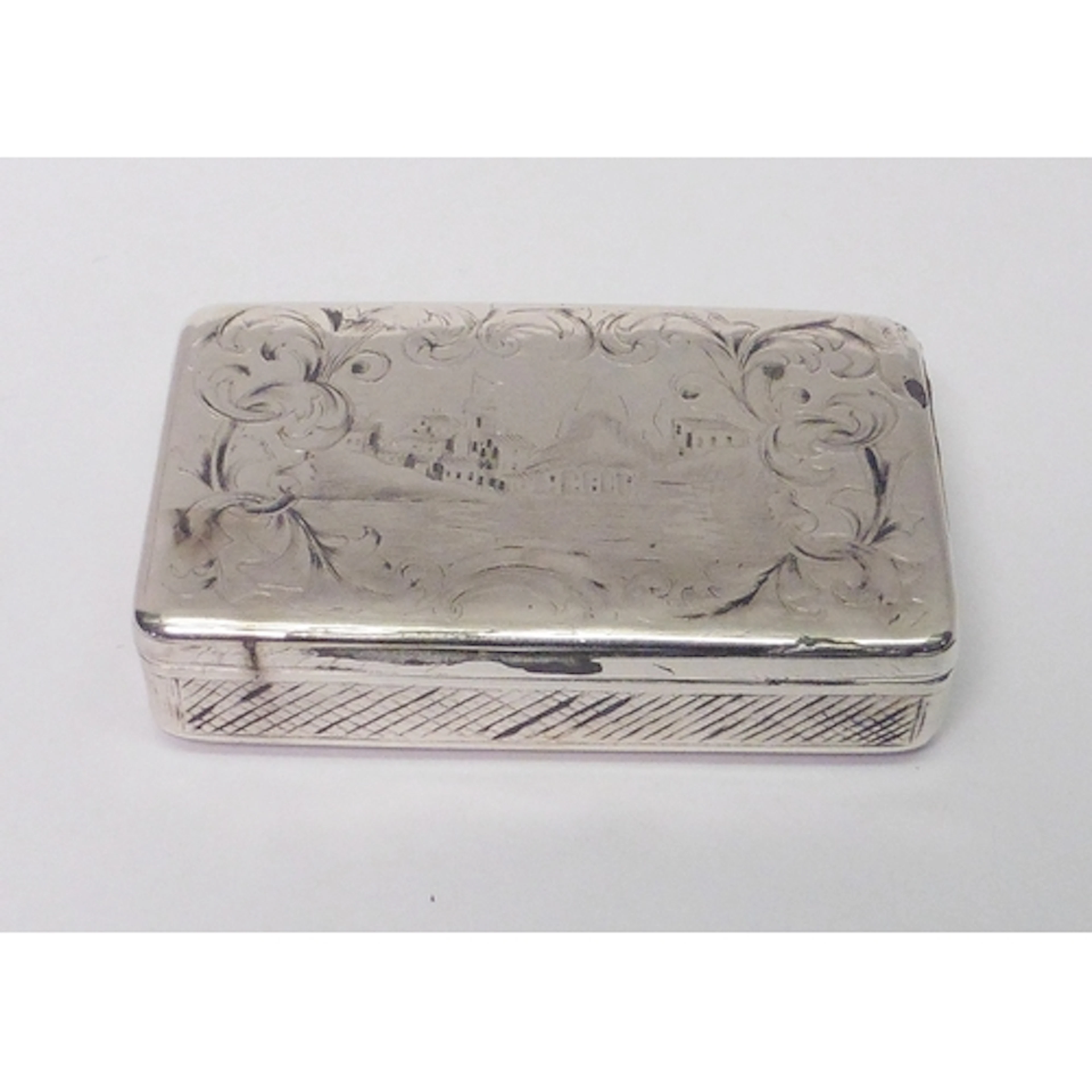 A mid-nineteenth century Russian snuff box engraved with lan...