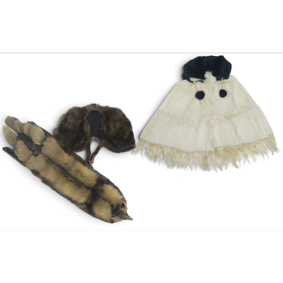 A Victorian ermine fur cape with black fur pompom neck ties ...