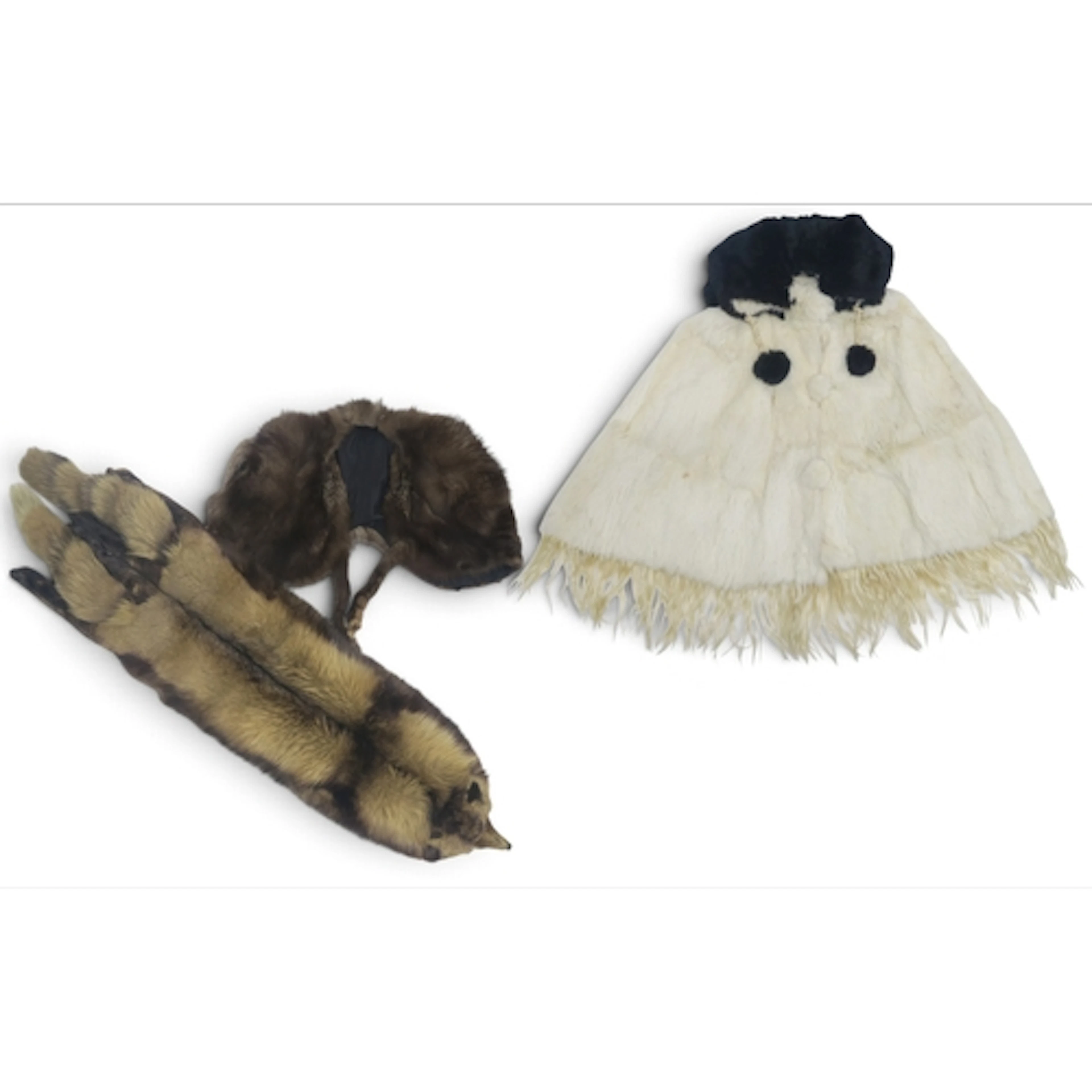 A Victorian ermine fur cape with black fur pompom neck ties ...