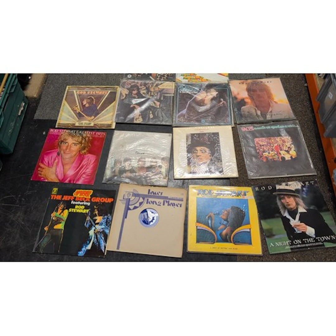 A collection of vinyl LPs by Rod Stewart and Faces, with a J...