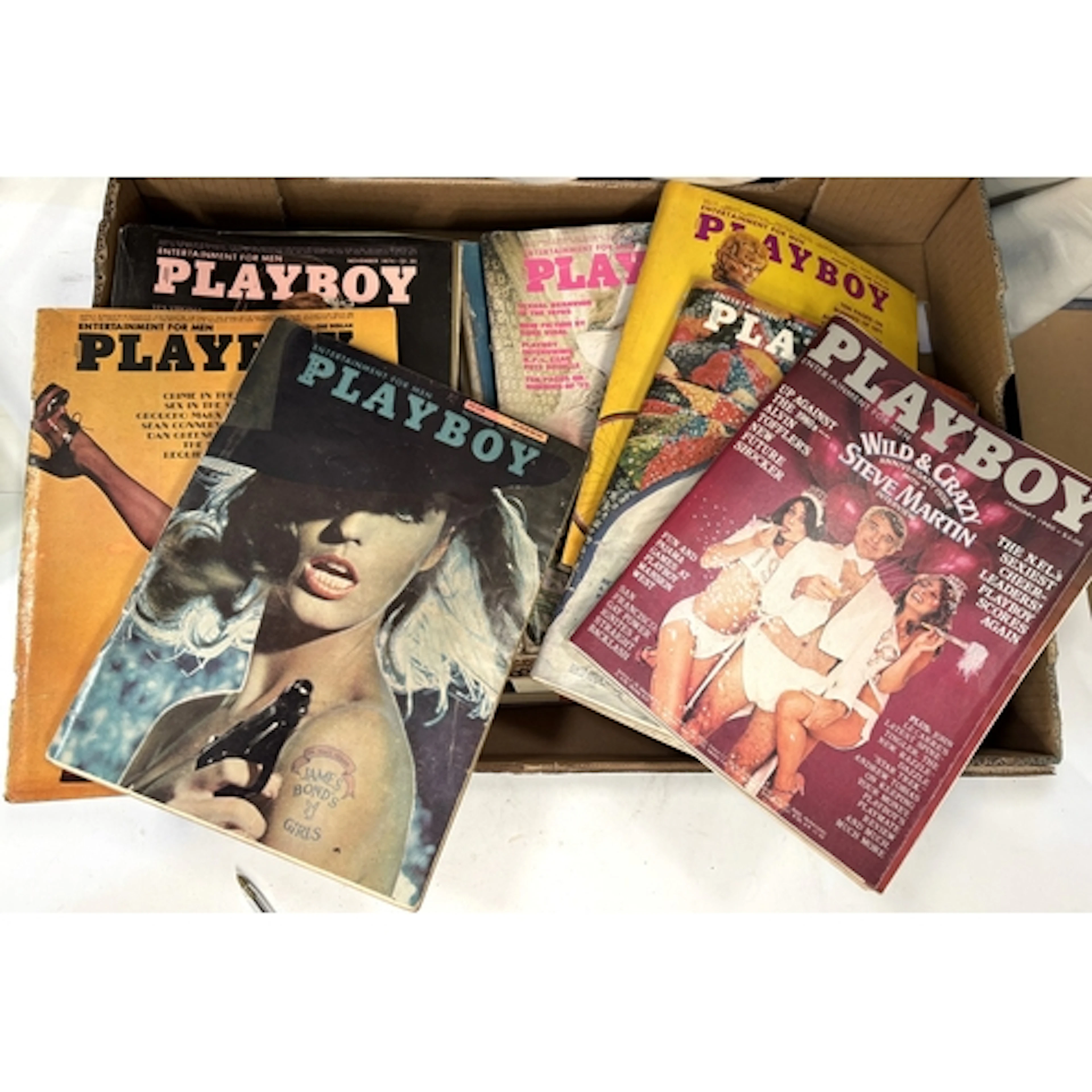 A large collection of various Playboy magazines from the 196...