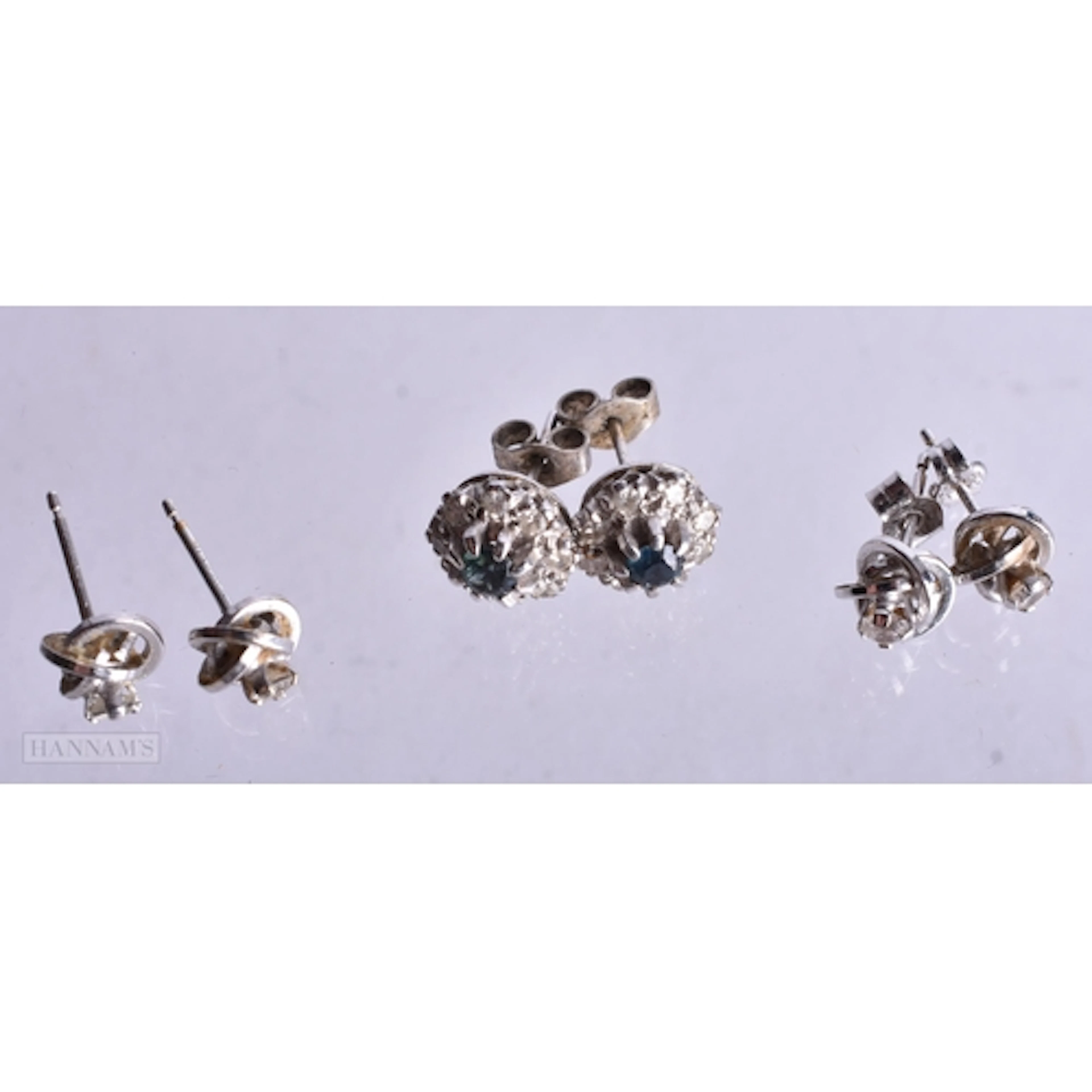 TWO PAIRS OF 9CT GOLD EARRINGS and a pair of white metal ear...