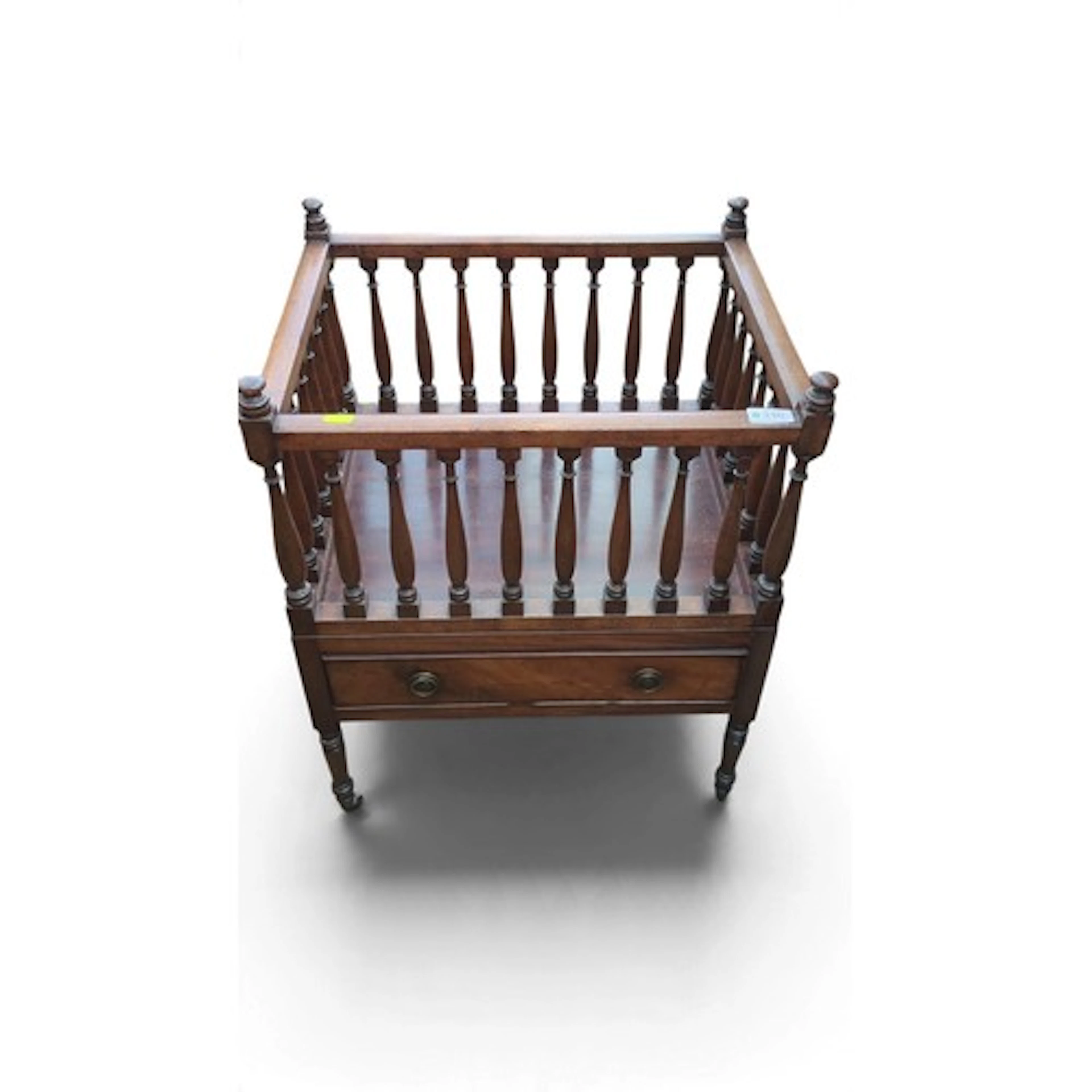 Mahogany galleried Canterbury with turned spindles enclosing...