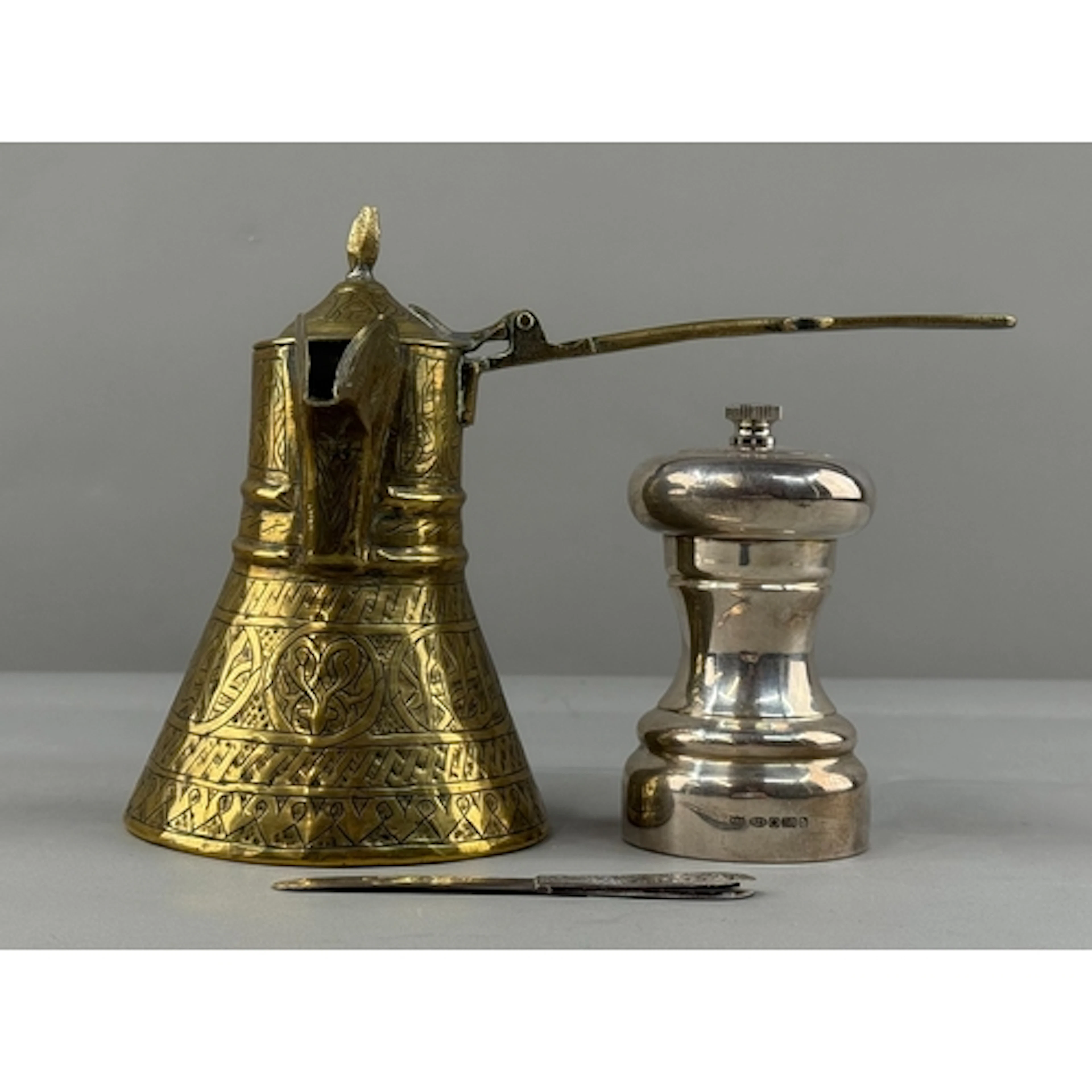 Metalware: a silver cased pepper grinder by Roberts & Do...