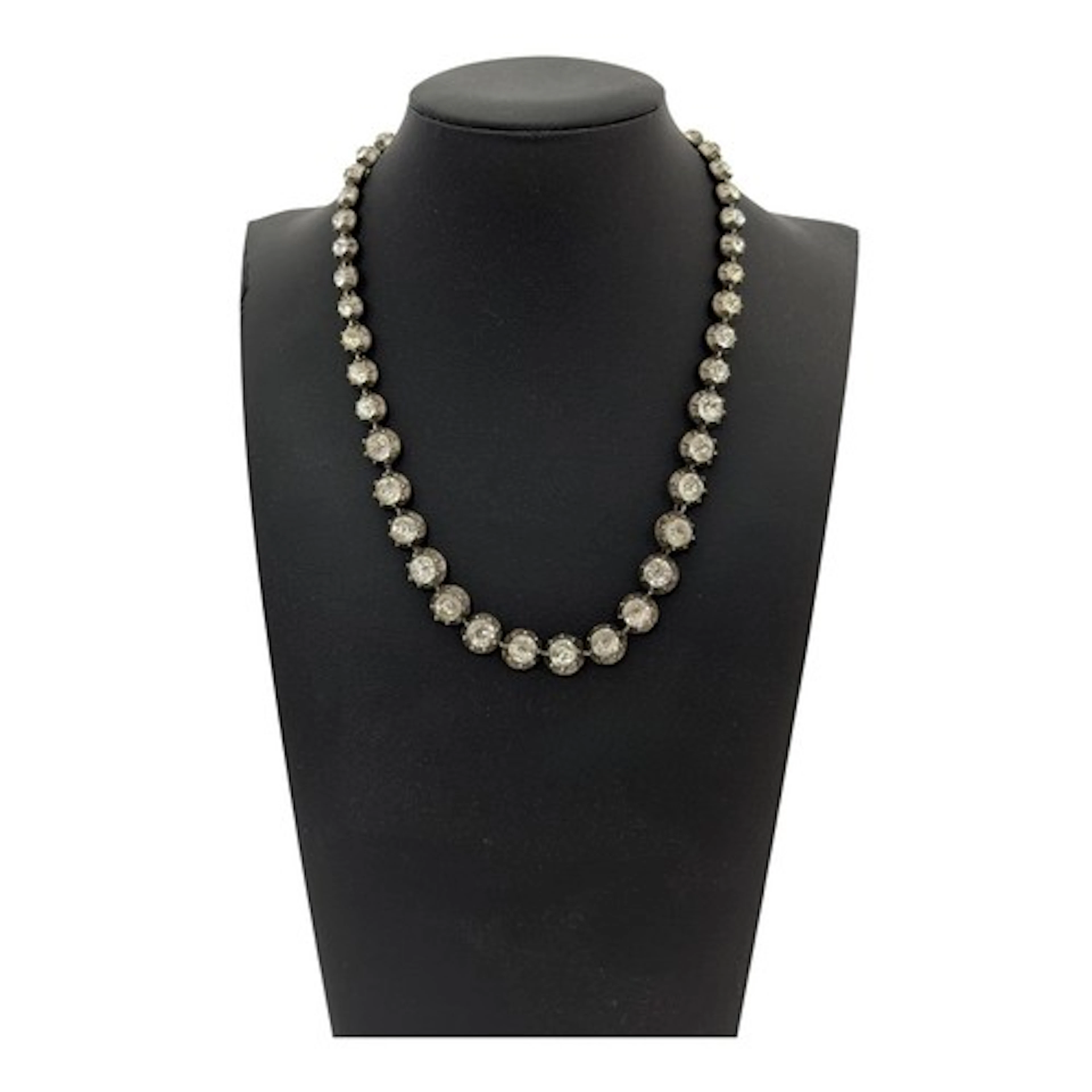 A Georgian colourless paste riviere necklace, unmarked white...