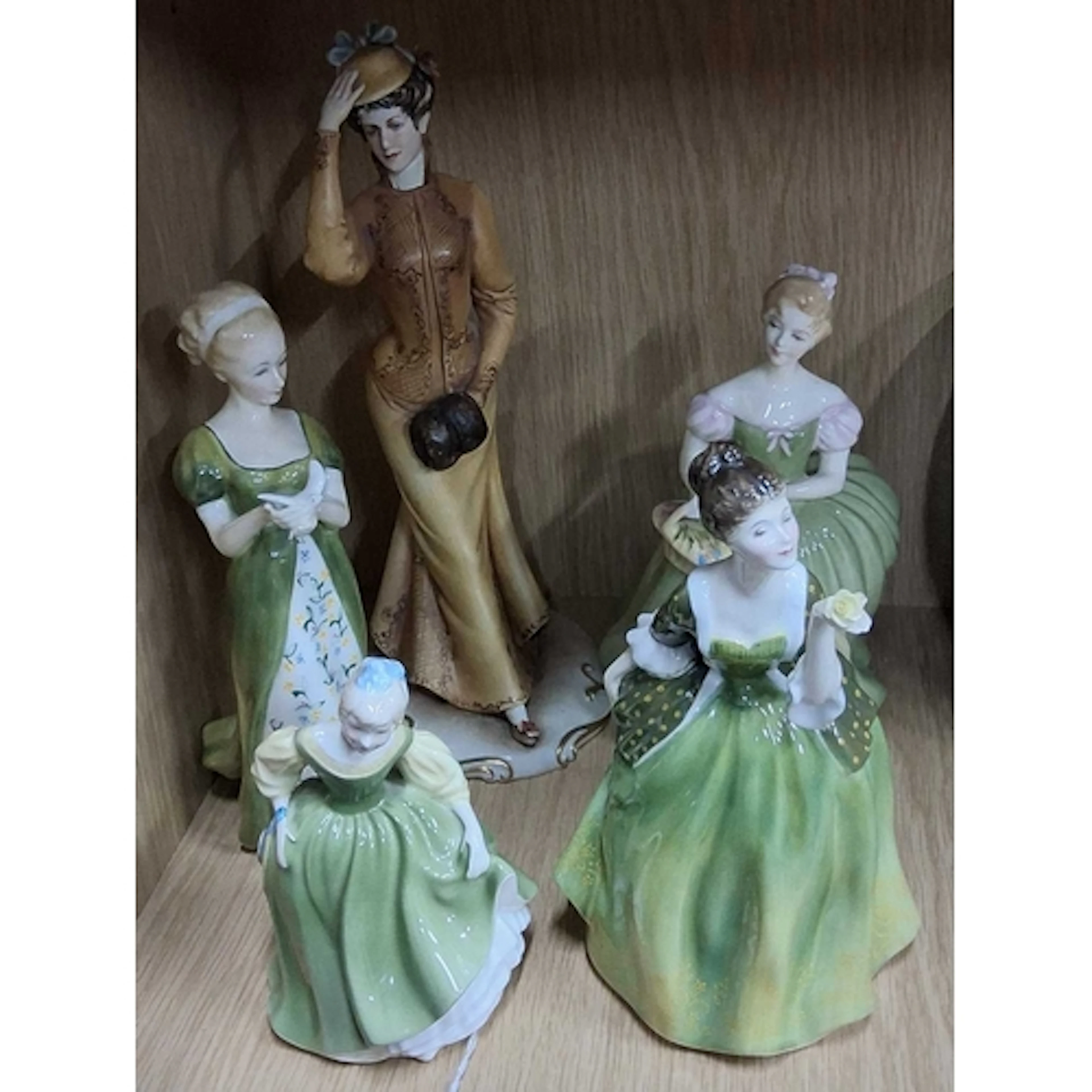 FOUR ROYAL DOULTON FIGURES AND A CAPODIMONTE FIGURE, compris...