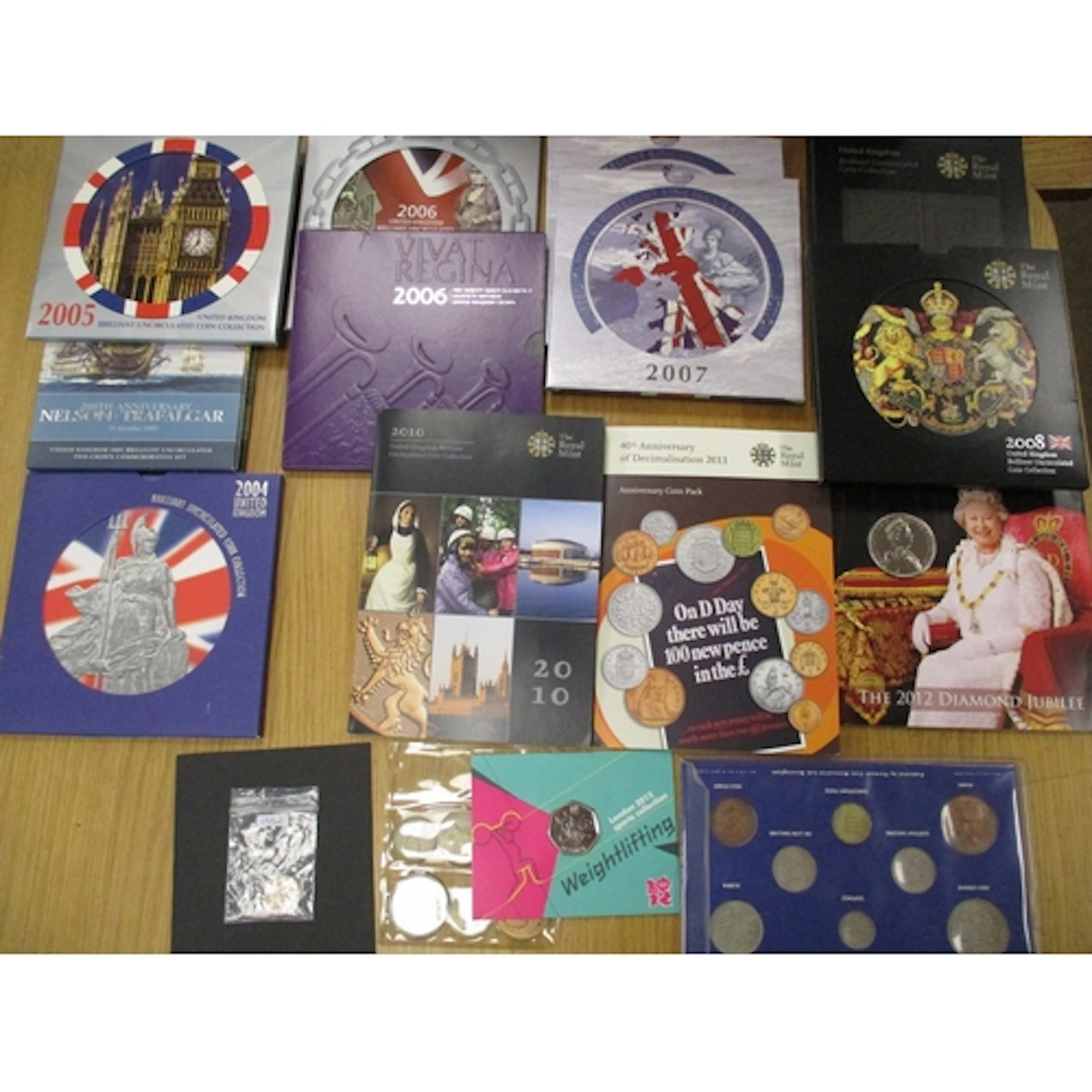 Collection of uncirculated year packs with 1983-2008 and 201...