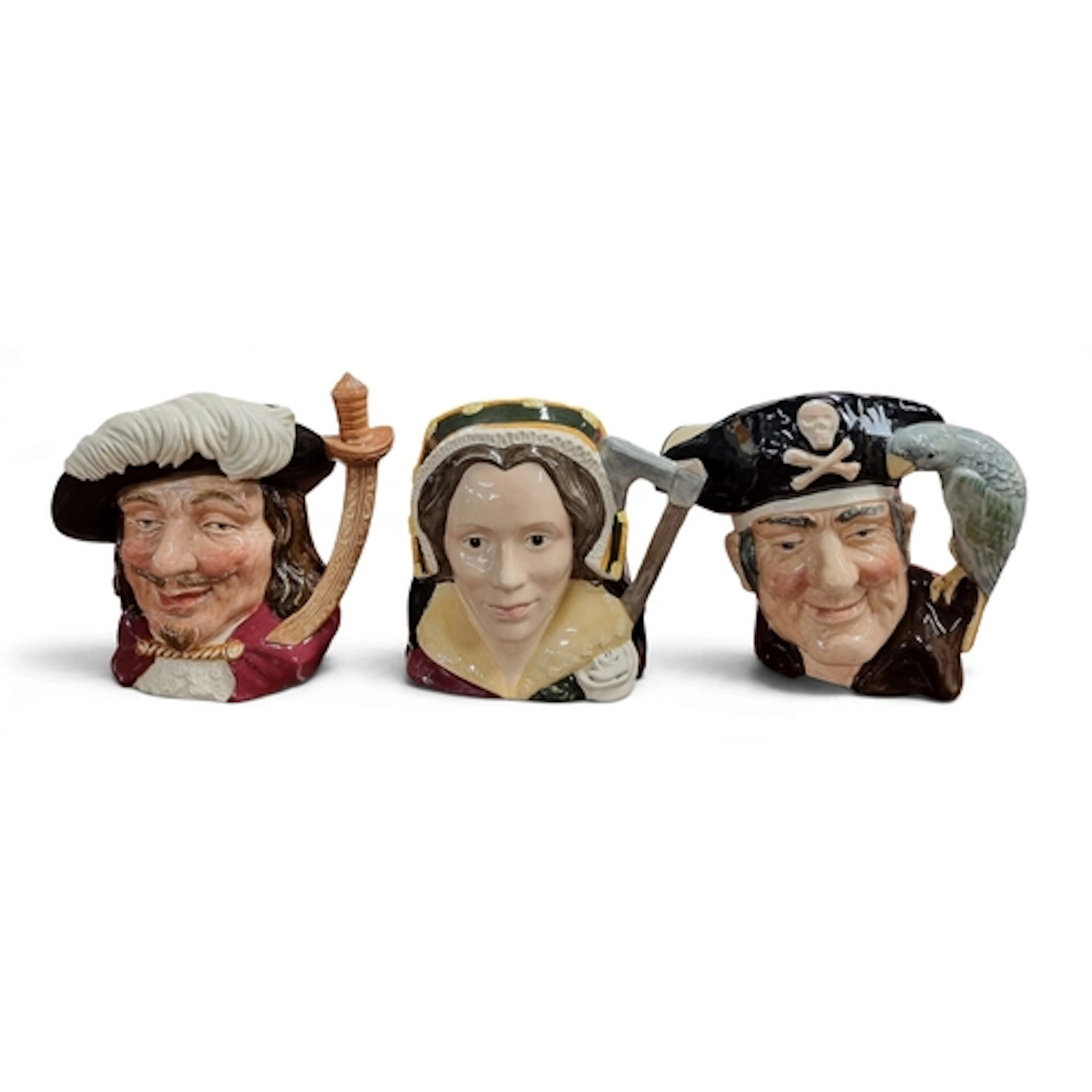 A group of three Royal Doulton Toby Jugs. H 18 cm approx.