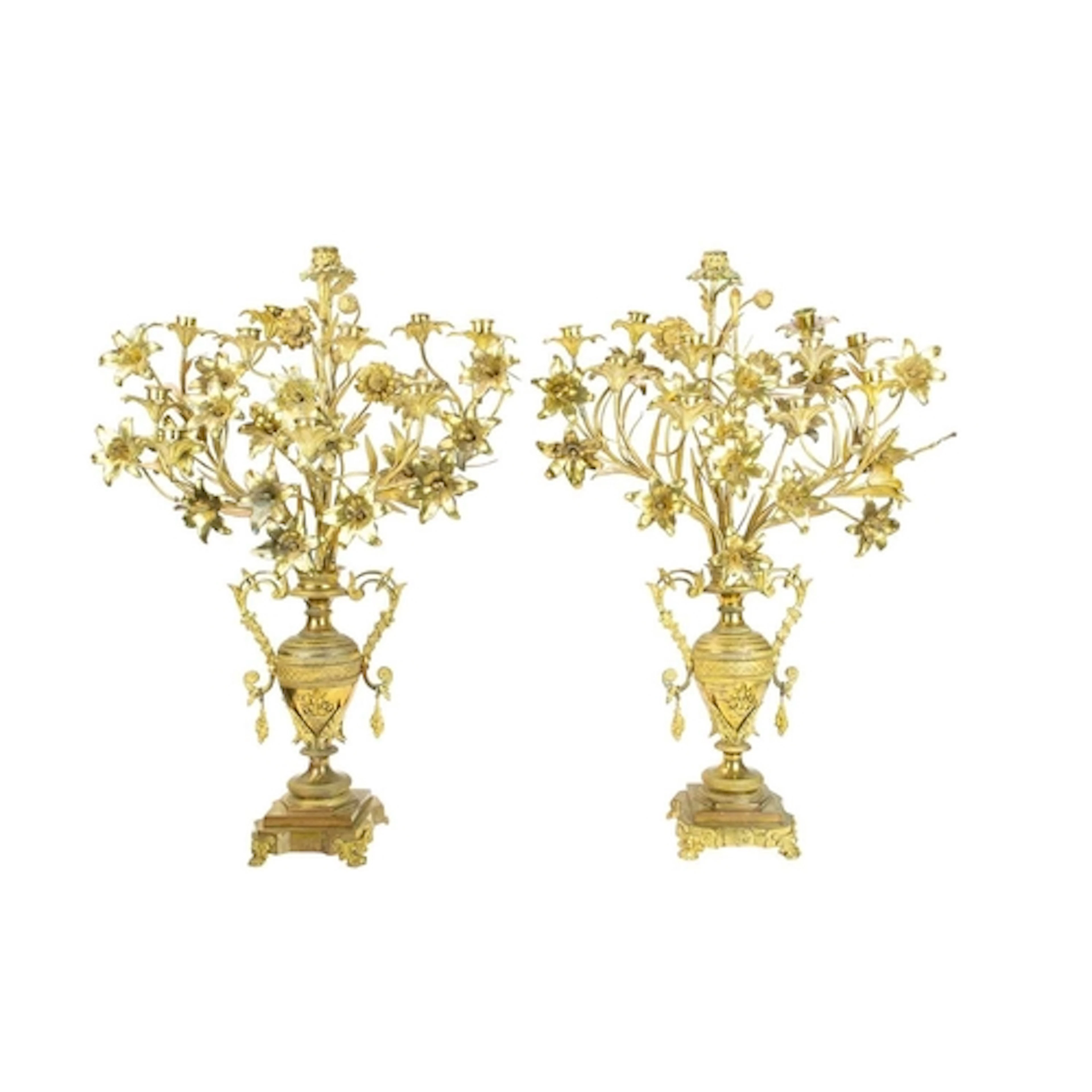 A pair of ornate large French gilt metal candelabra. 19th ce...