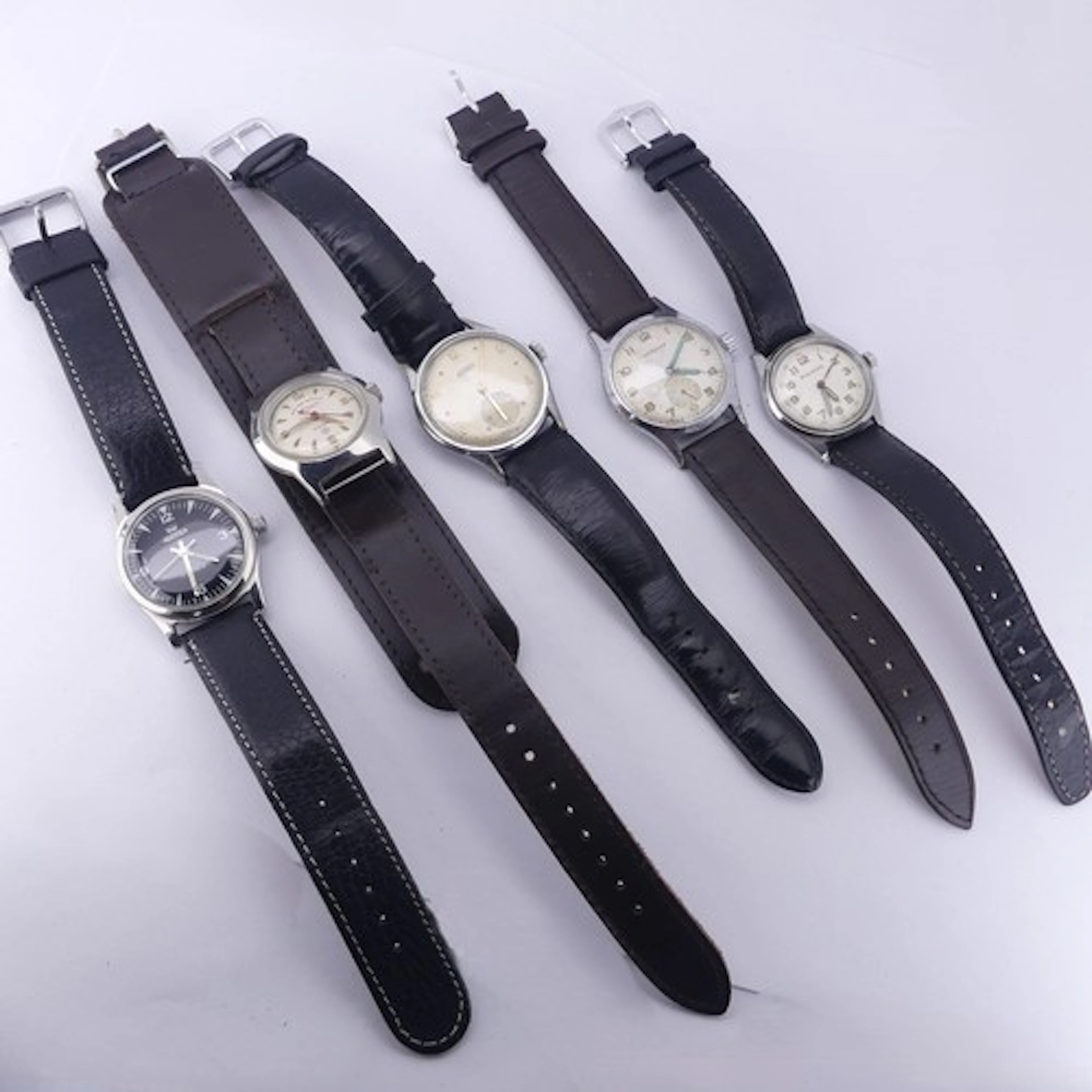 A vintage Roamer stainless steel Wristwatch, the black dial ...