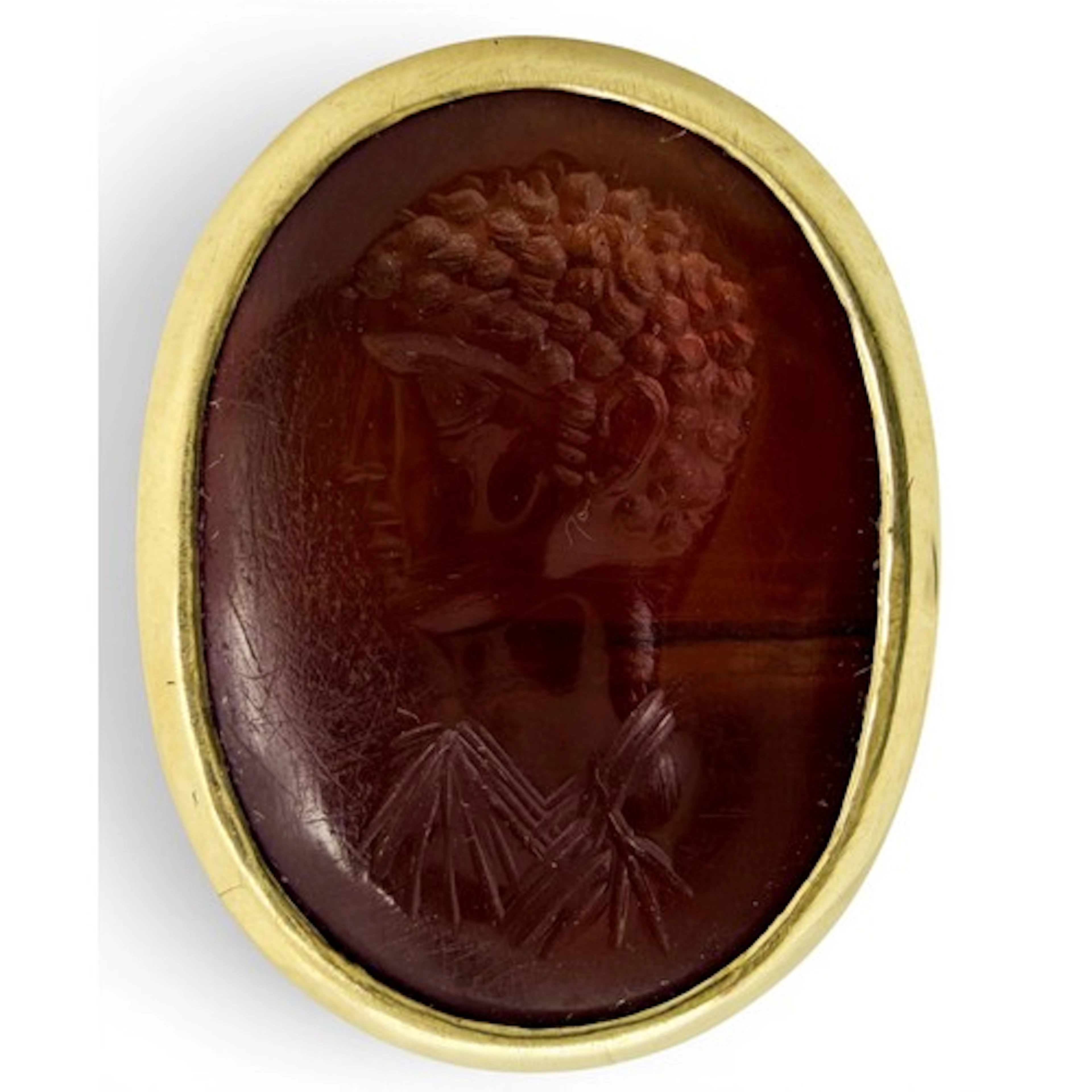A high-carat gold ring set with an ancient Roman carnelian i...