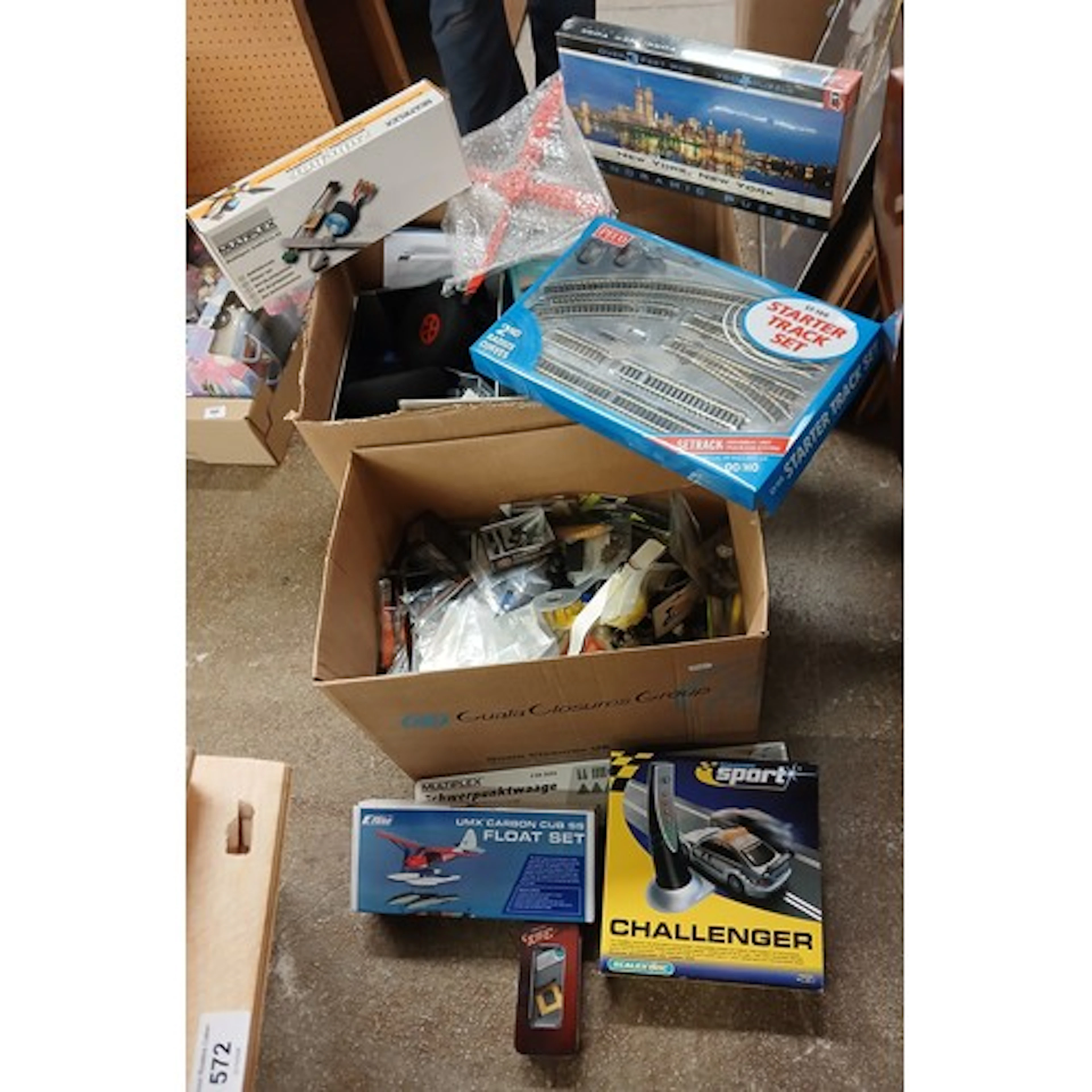Two boxes plane parts, jigsaw, railway track set, helicopter...