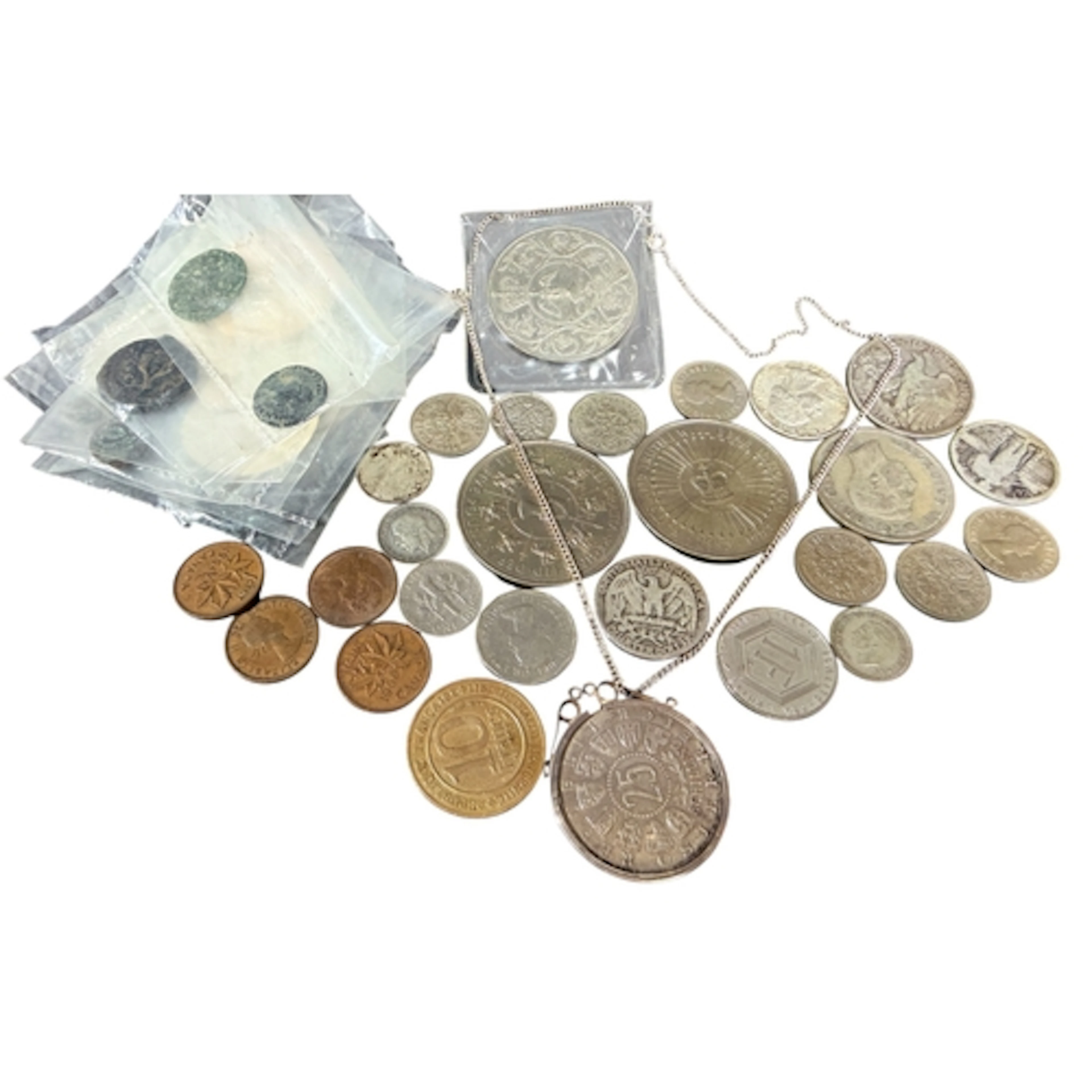 A collection of various world coinage to include ancient Rom...