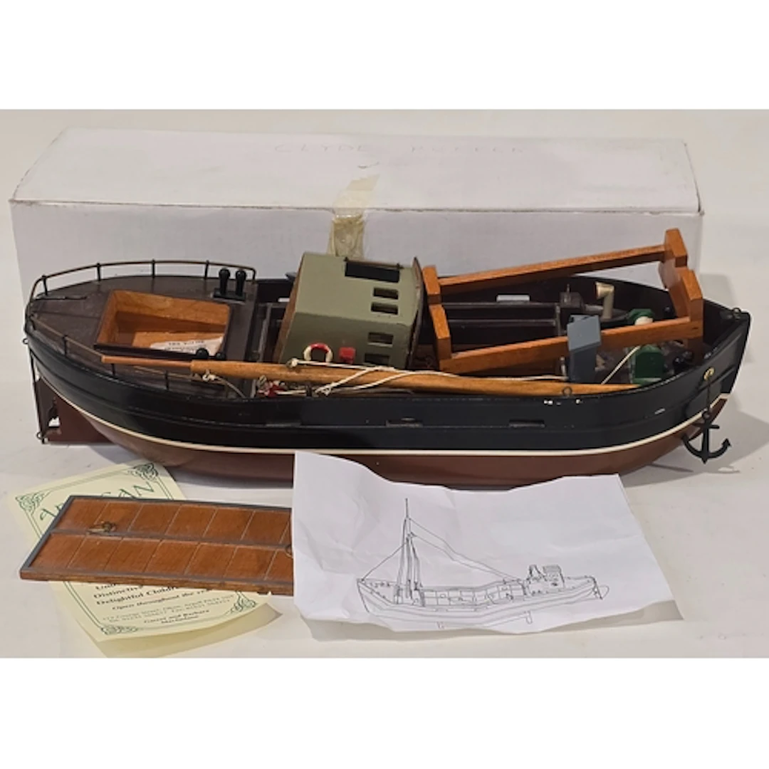 A vintage scratch built model of the "Clyde Puffer" boat. Bo...