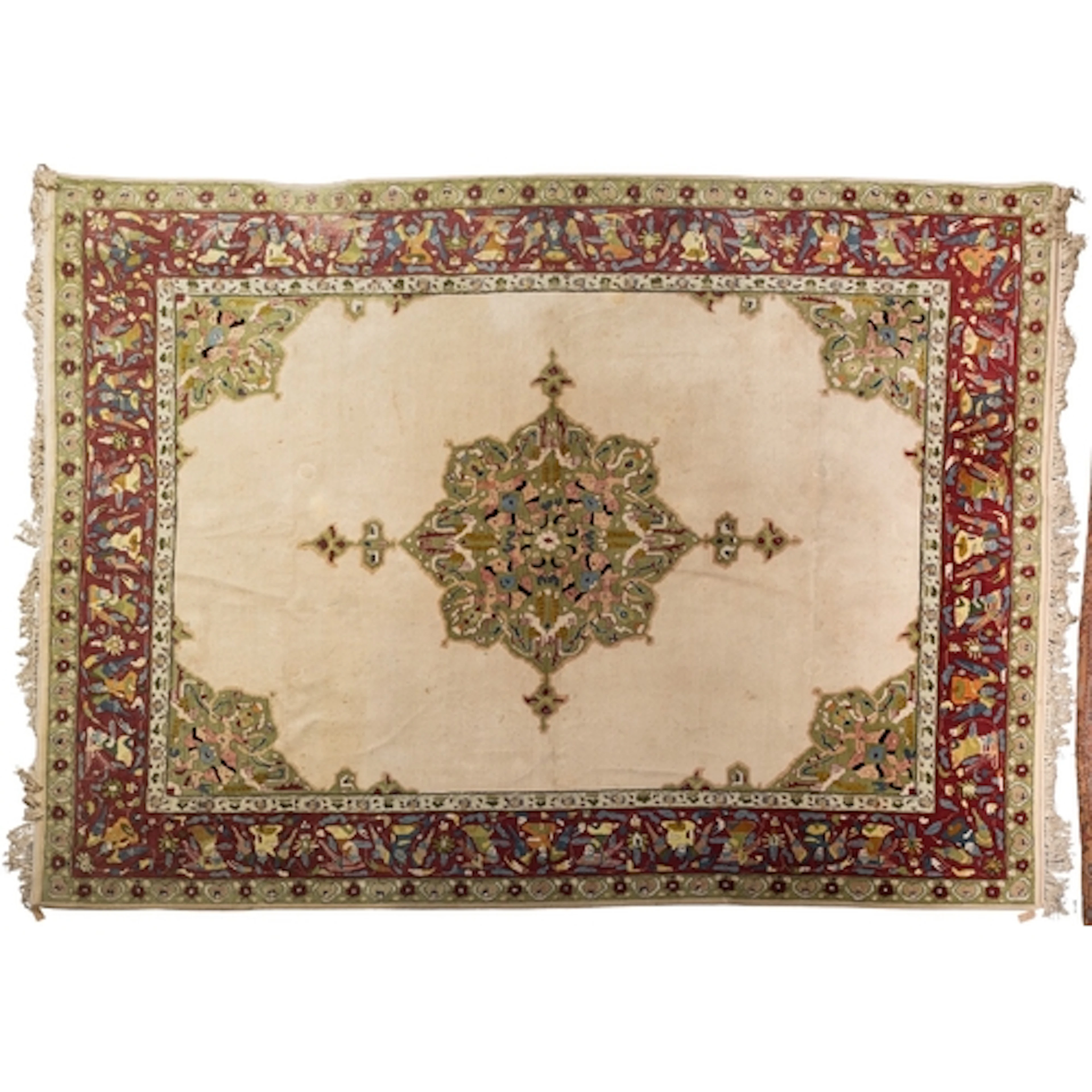 A Connemara carpet the ivory field with a central green shap...