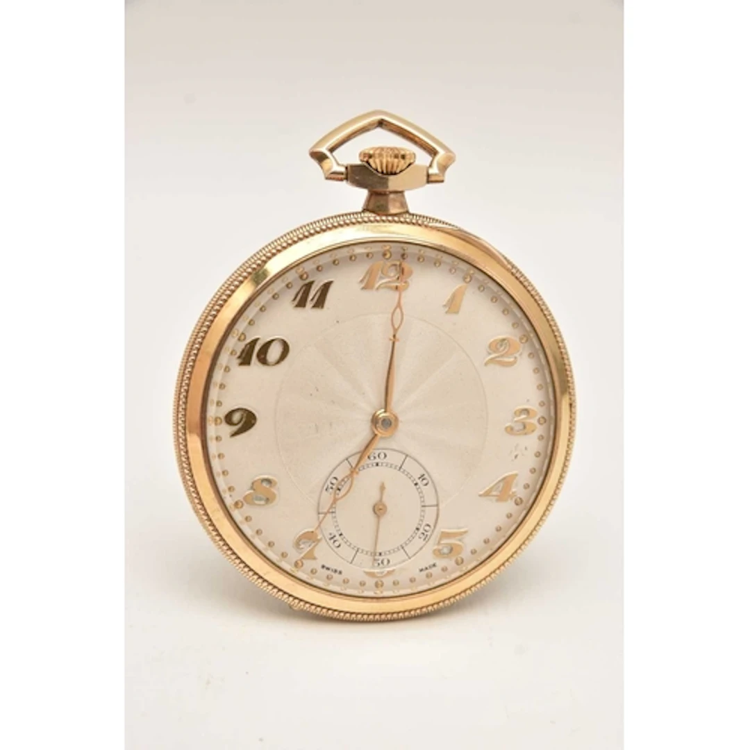 A 1920s - 1930s ROLLED GOLD SLIM LINE OPEN FACE, TOP WIND PO...