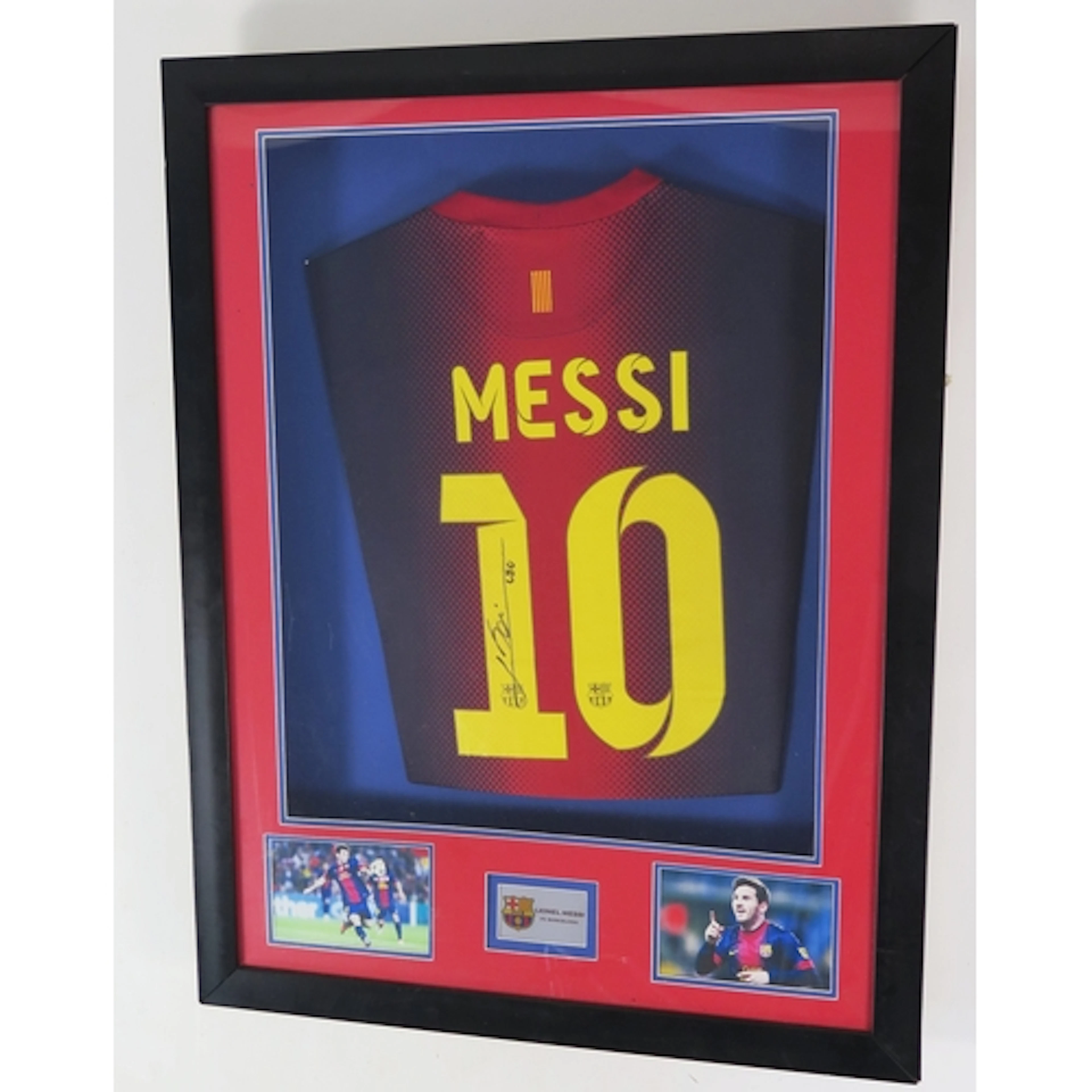 Lionel Messi, a signed Barcelona shirt, mounted and framed.