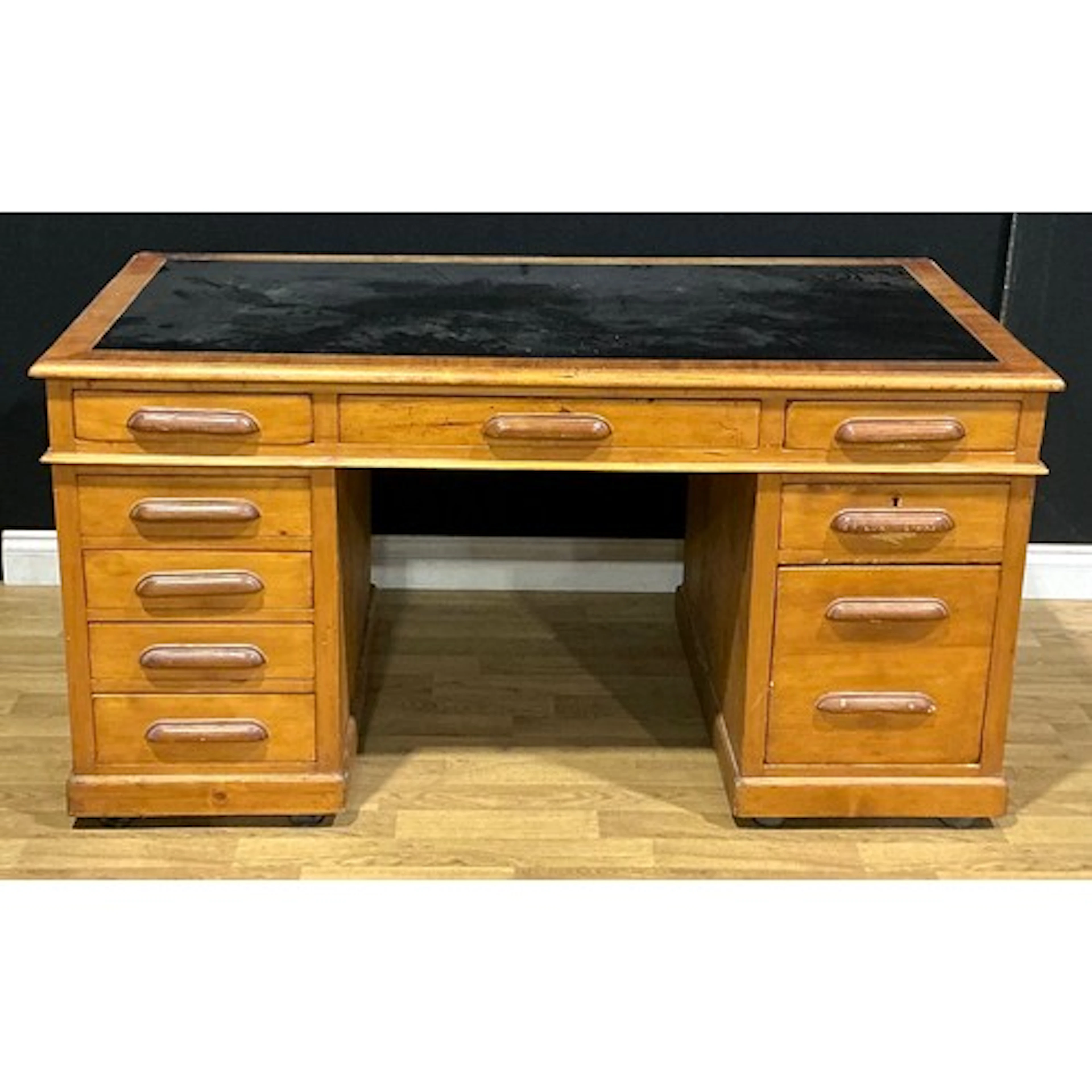 An Art Deco period mahogany and pine twin pedestal desk, rec...