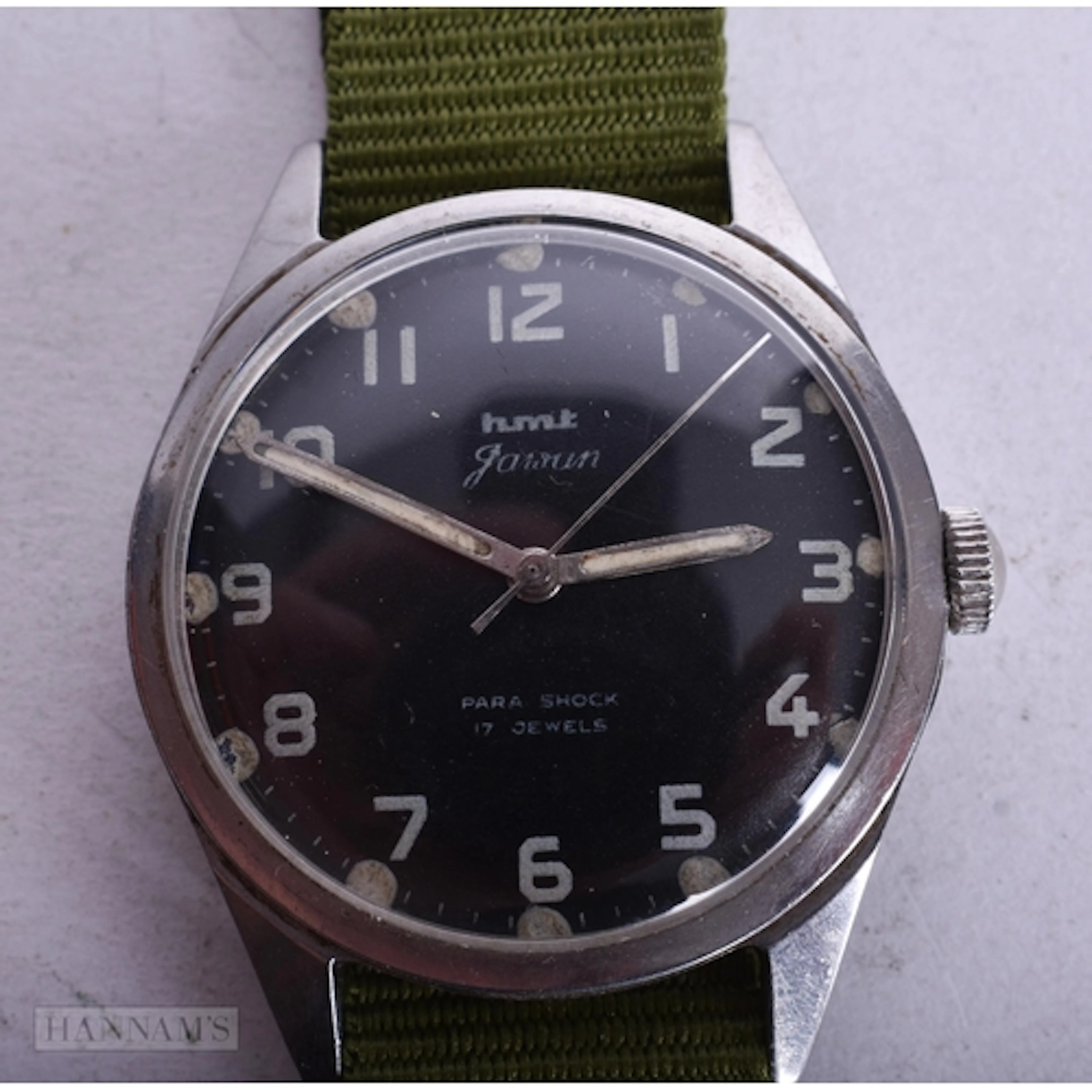 AN HMT PARA SHOCK MILITARY WRIST WATCH. Running. 3.25 cm wid...