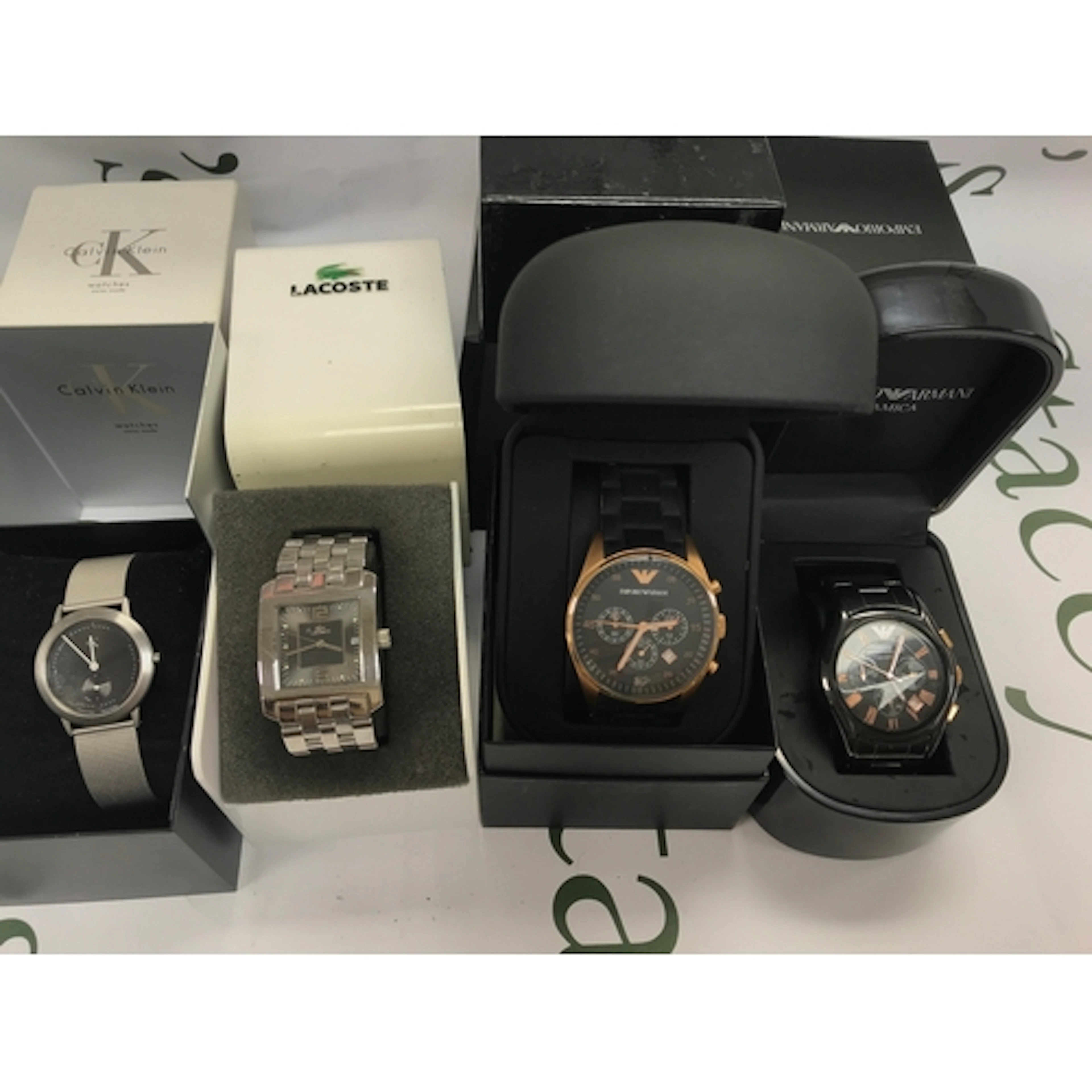 Four gents fashion watches including Armani and CK.