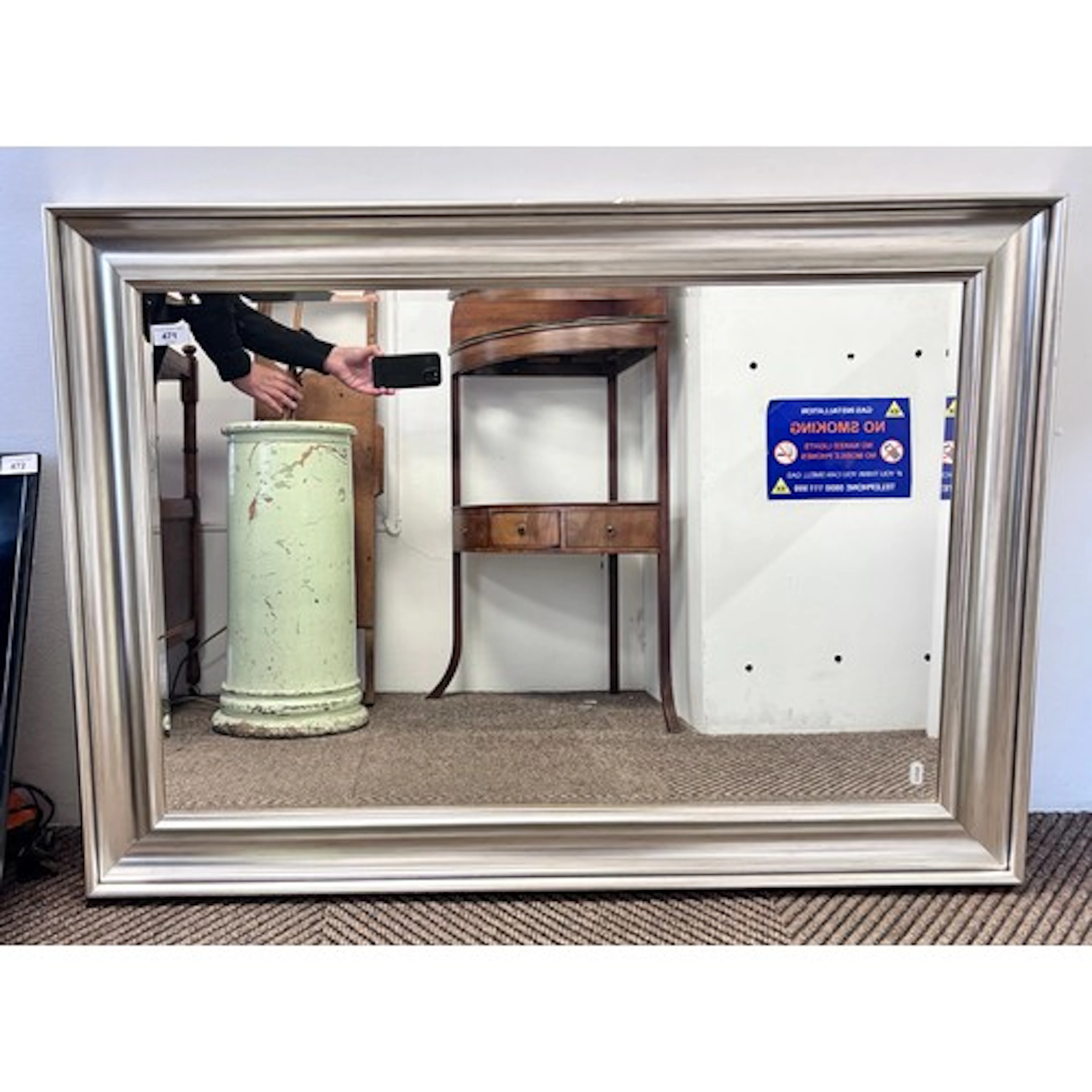 Silver framed rectangular mirror, 105cm x 77cm.