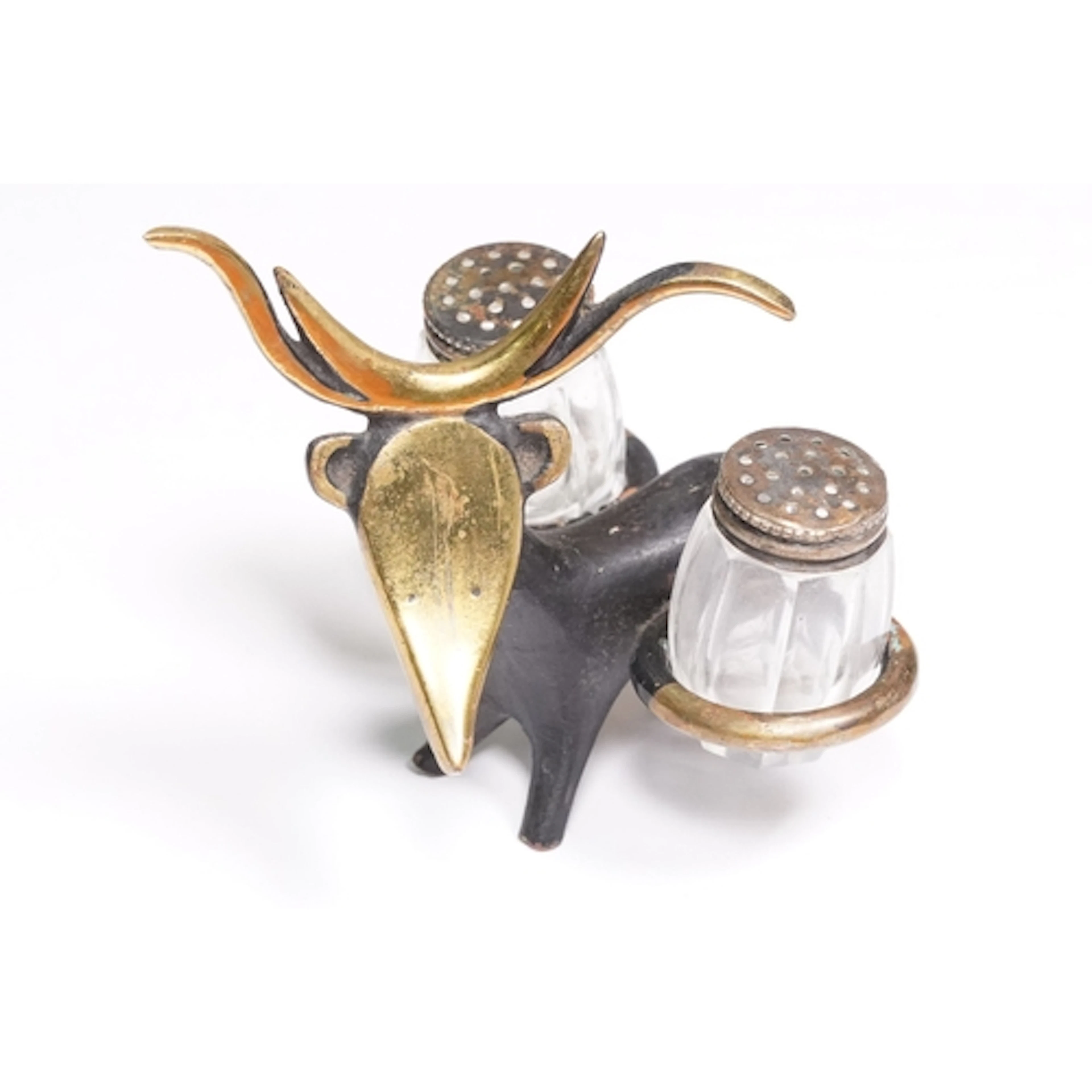In the manner of Walter Bosse of Hagenauer, a bronze cruet s...