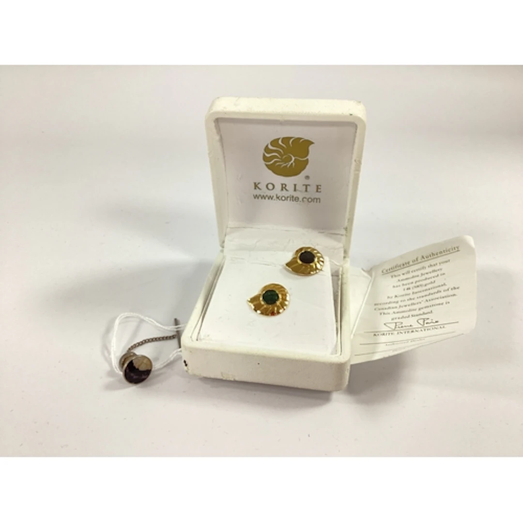 Korite Tie Pin, of fossil design; together with another simi...