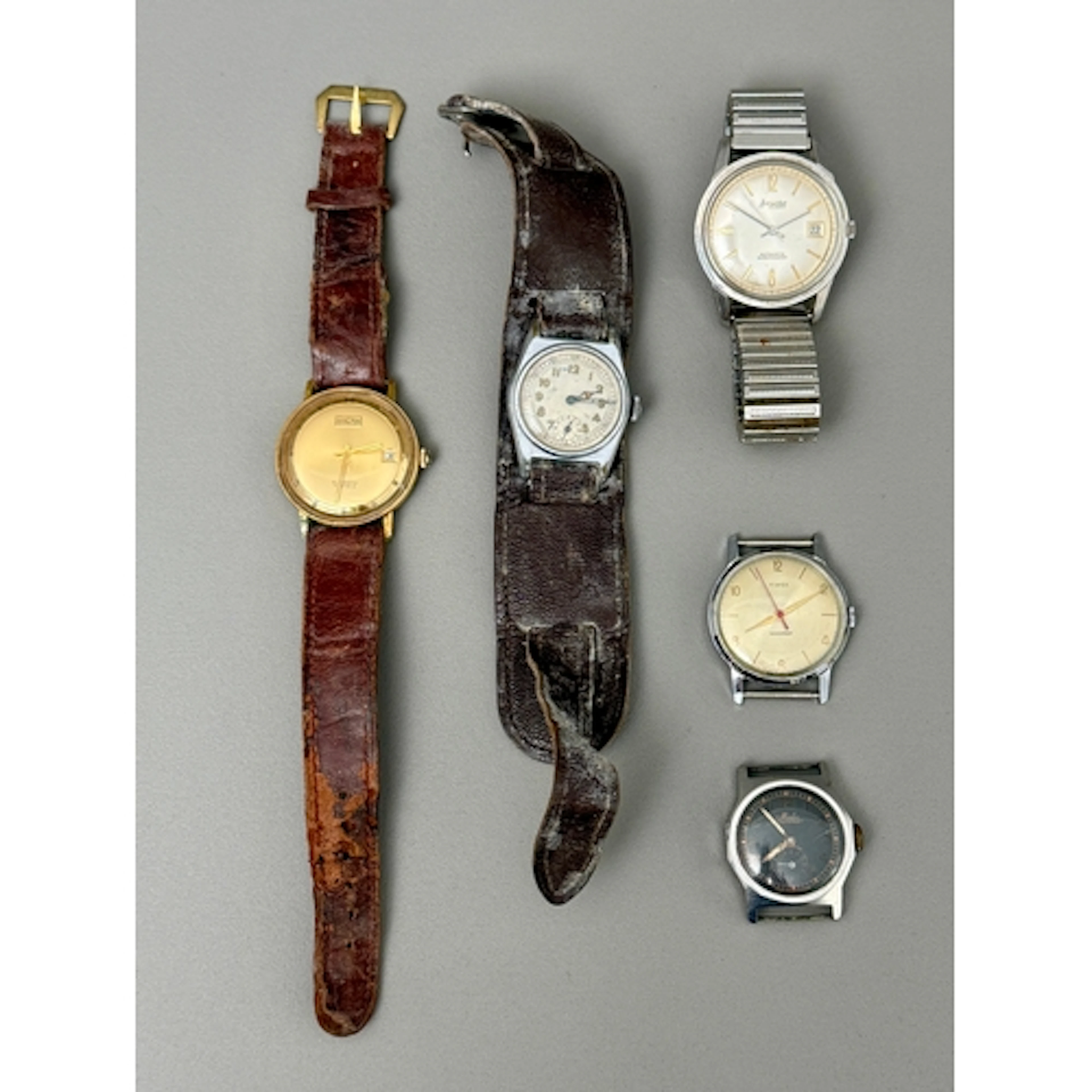 Five vintage 1940s-60s wrist watches - including a Vulcain C...