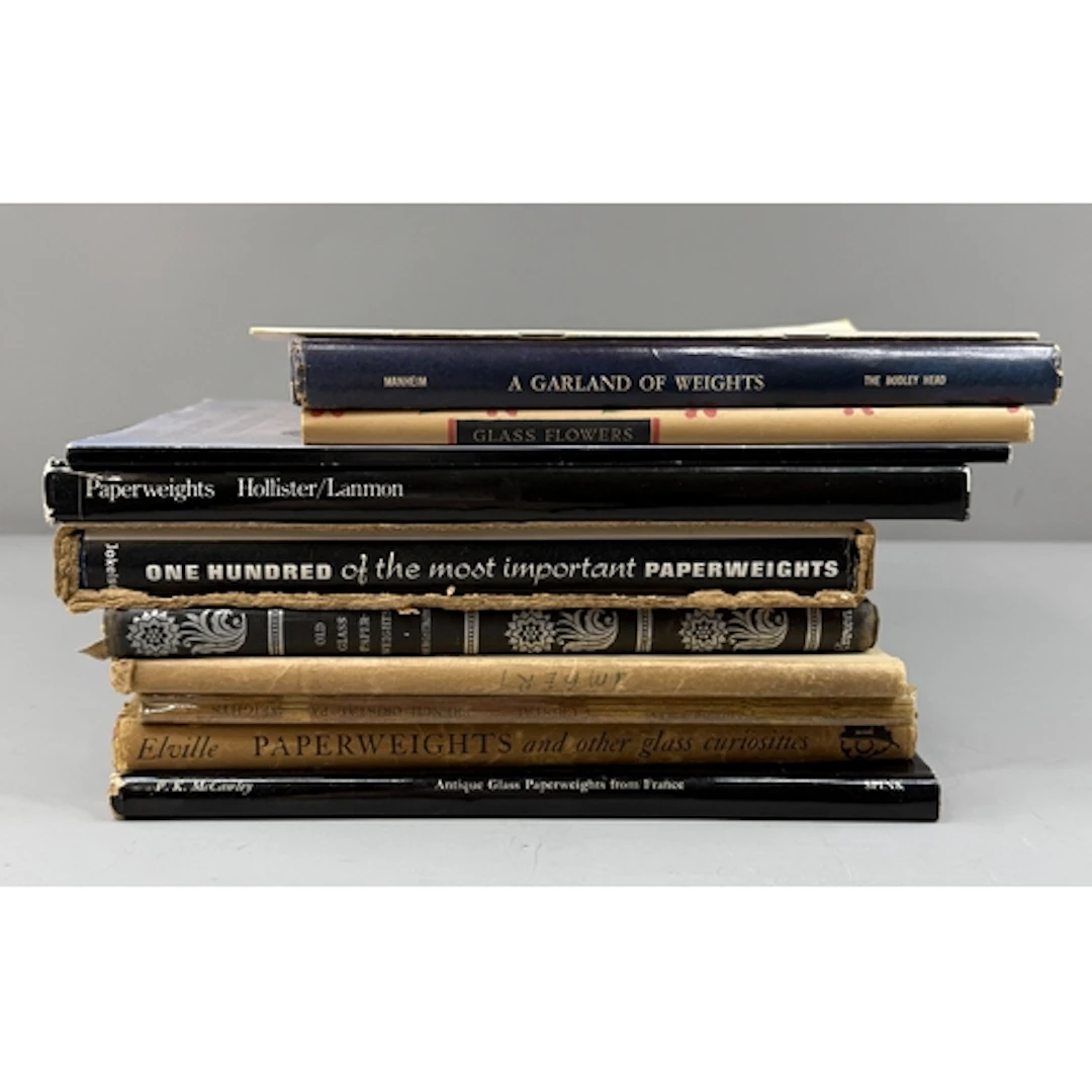 Ten books and catalogues relating to glass paperweights, inc...