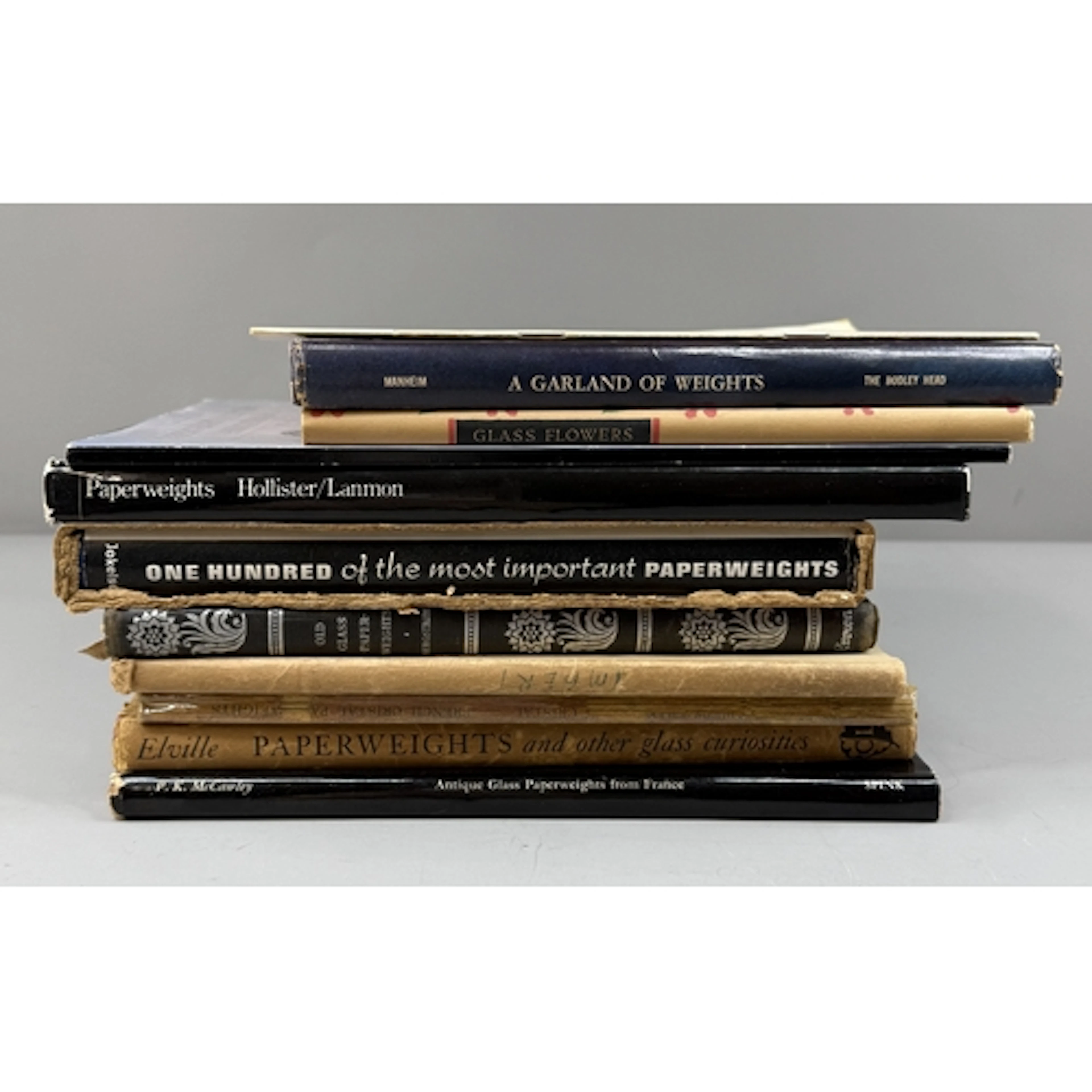 Ten books and catalogues relating to glass paperweights, inc...