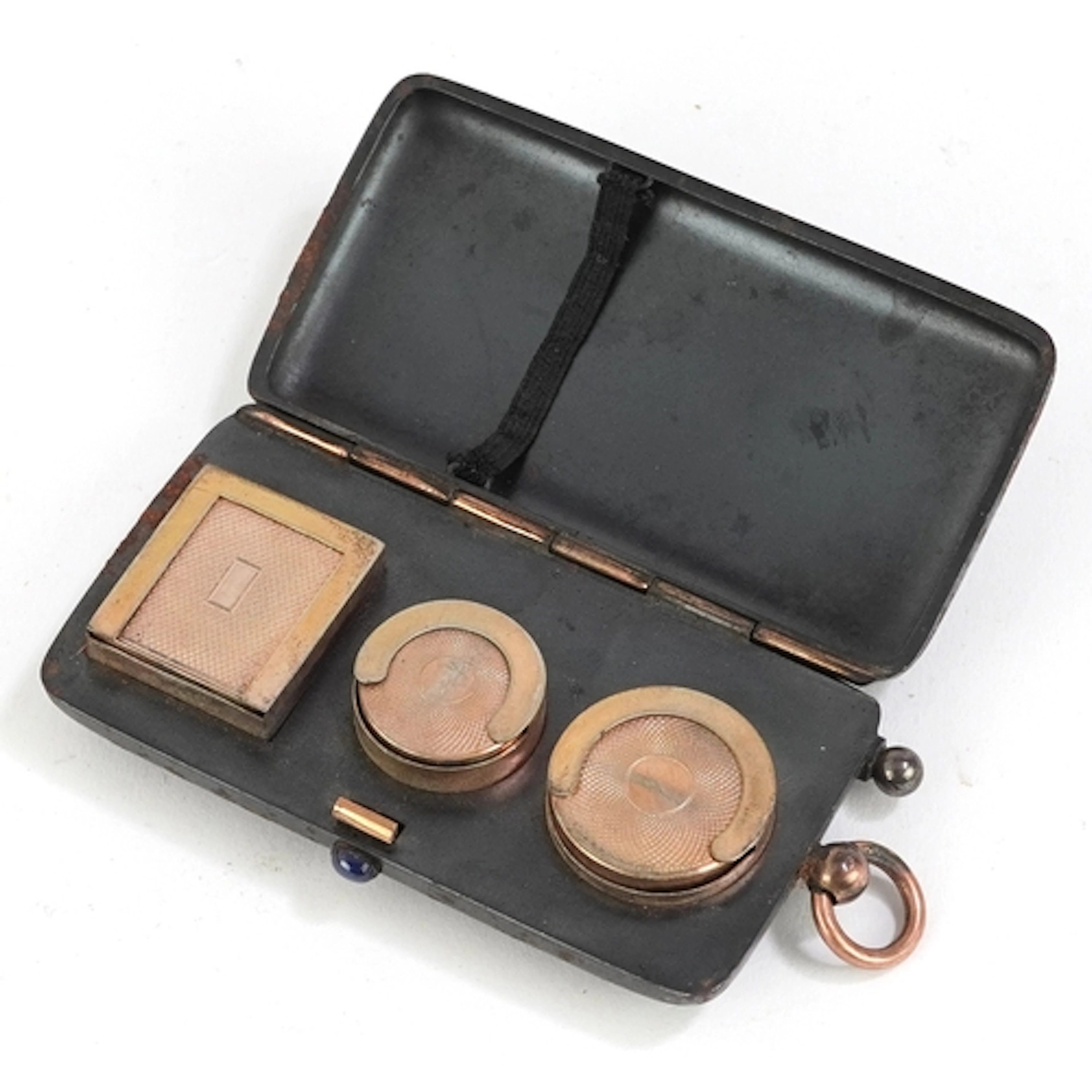 Antique gunmetal combination sovereign, half Sovereign and s...