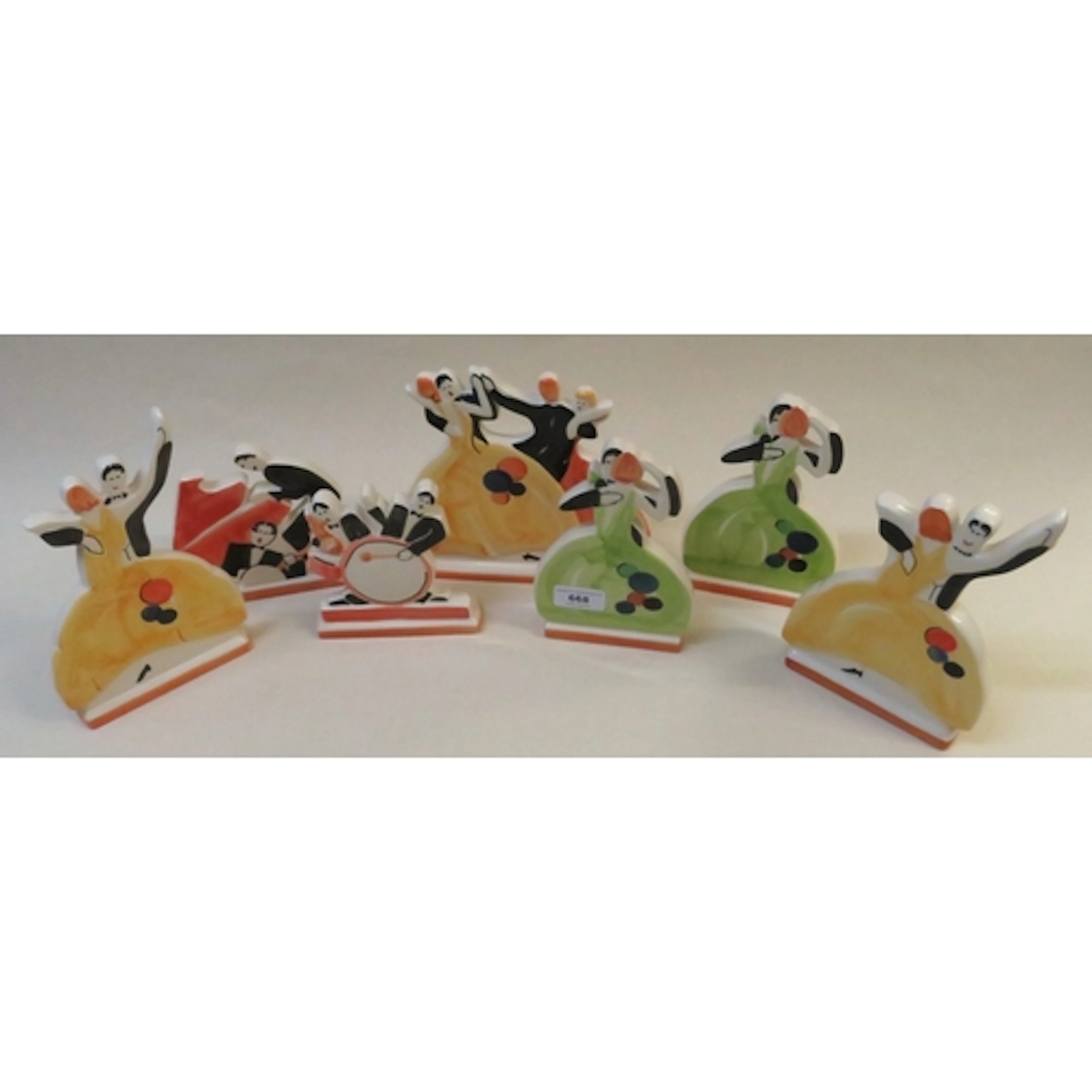 Group of seven ' Age of Jazz ', figures of dancers and musi...
