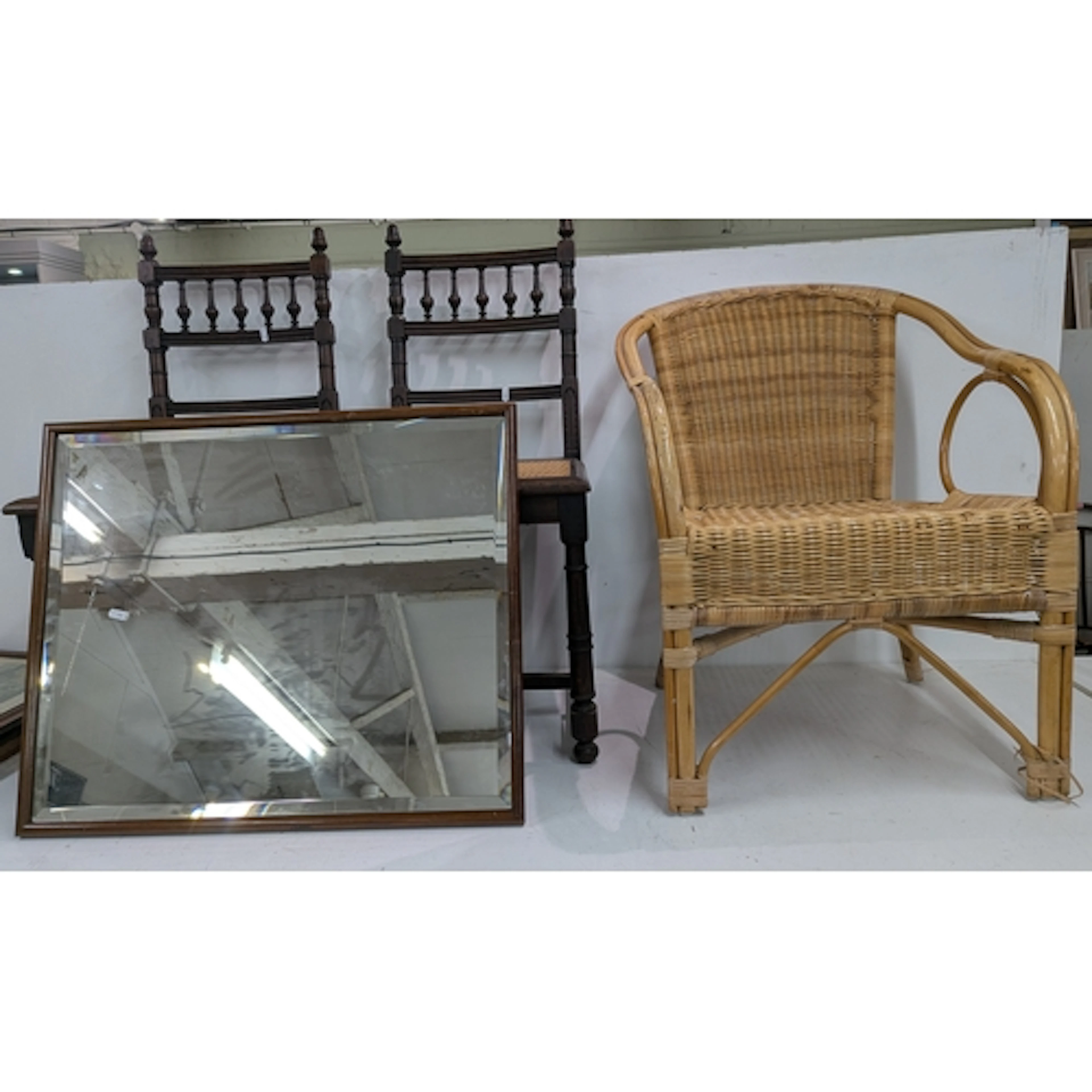 A pair of 19th century oak chairs, cane seats, spindle backs...