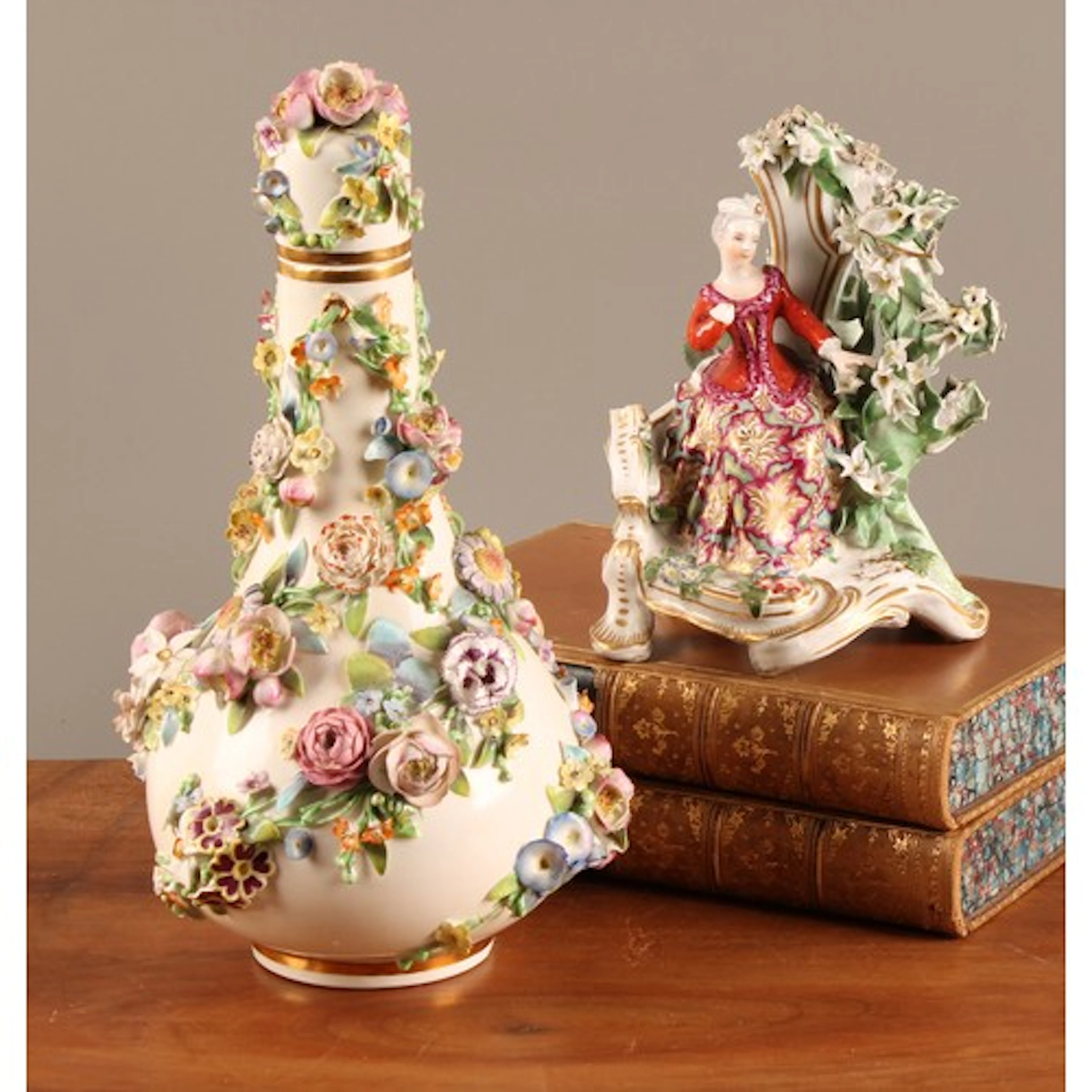 A Coalbrookdale type porcelain bottle vase and cover, profus...