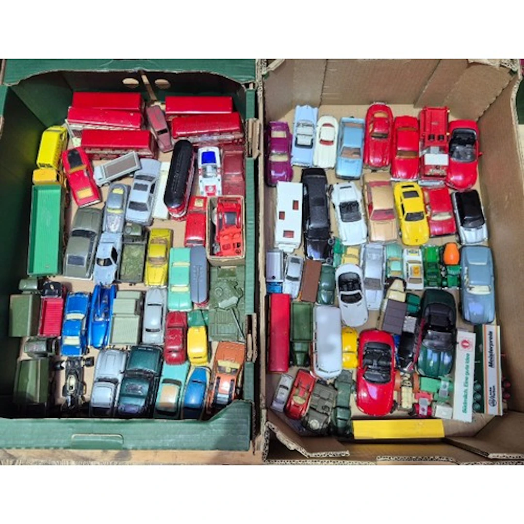 Two boxes of assorted diecast model vehicles to include Dink...