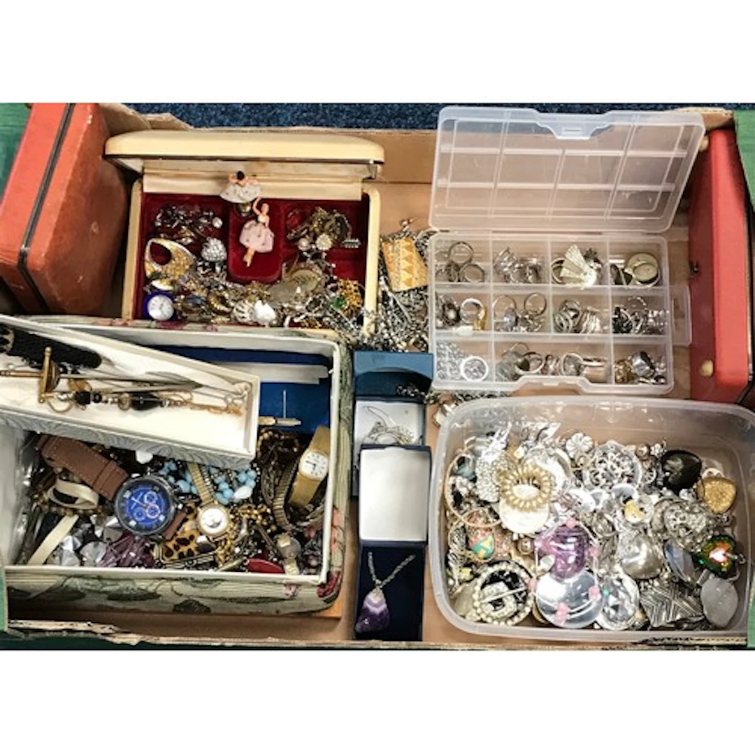 A qty of costume jewellery and watches