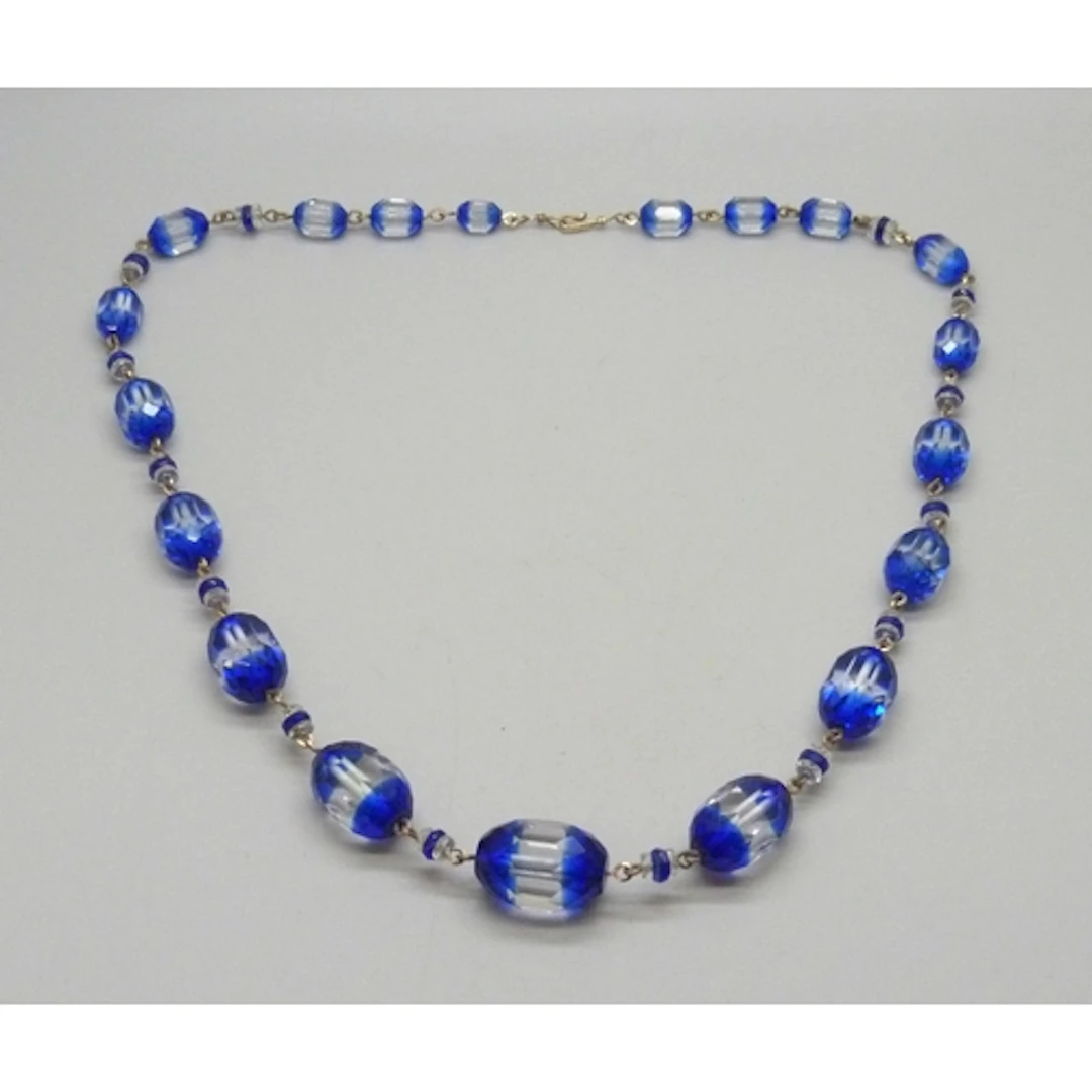 A statement Czech Art Deco blue and clear bead necklace, 58....