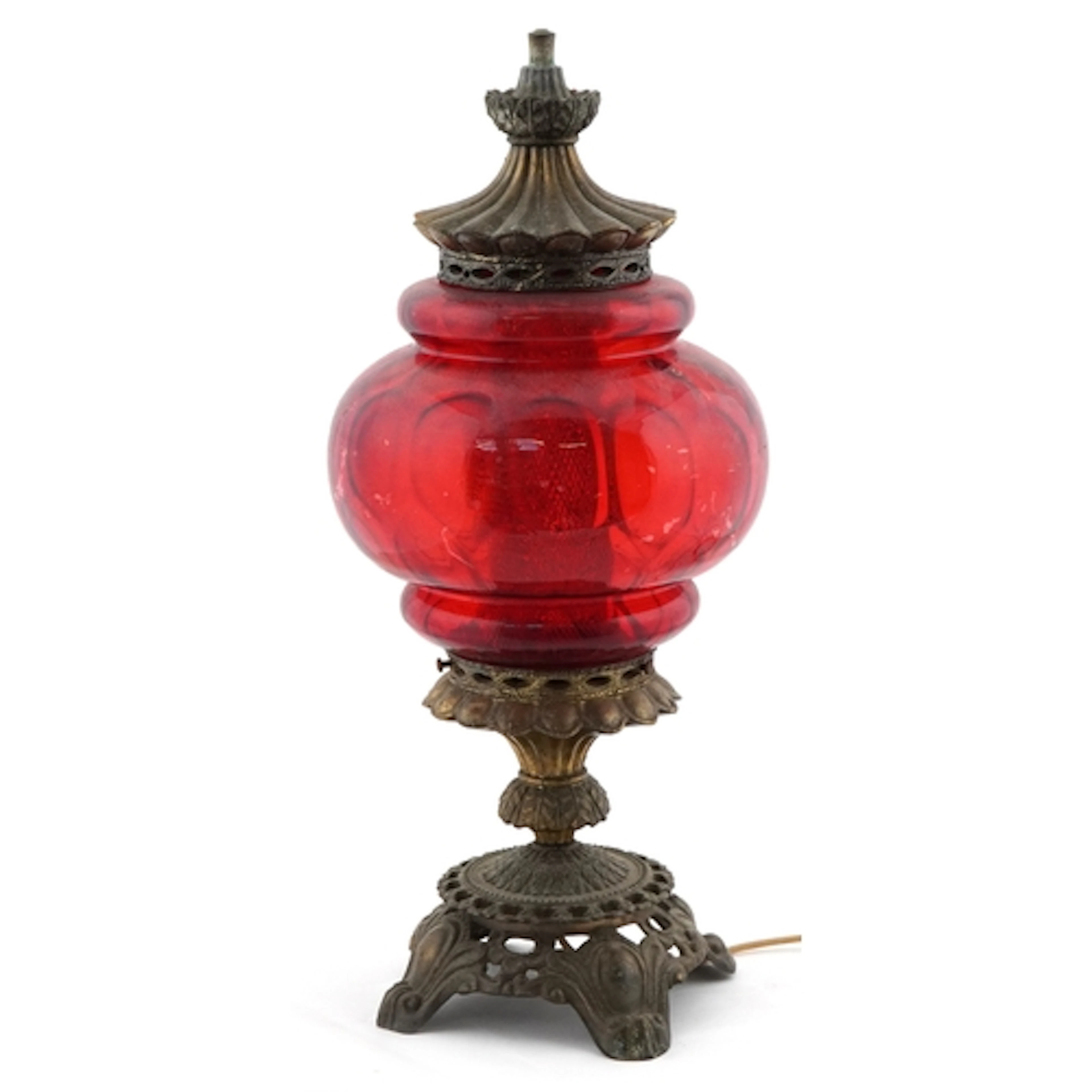 Vintage brass oil lamp having painted red glass shade, conve...