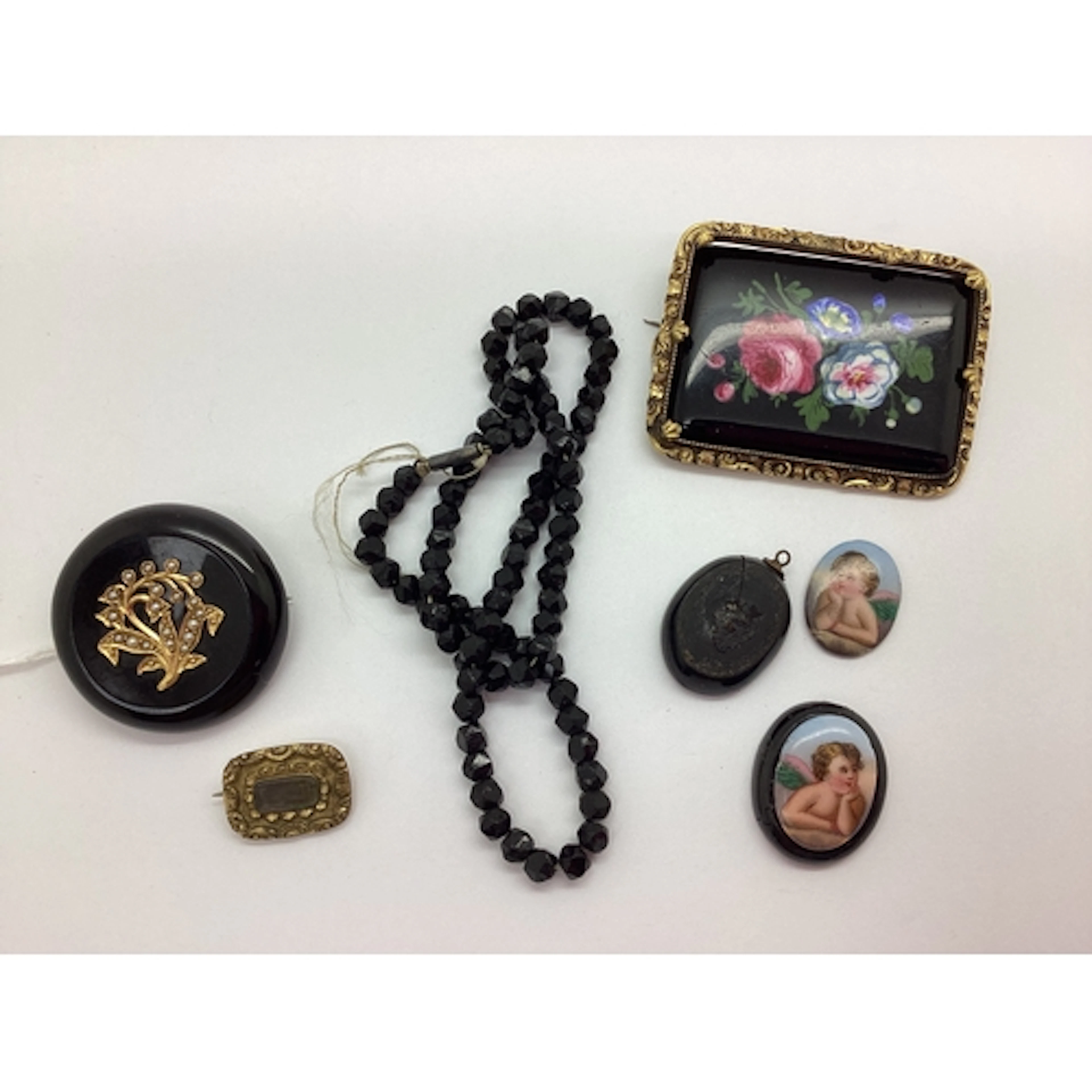 A Victorian Seed Pearl Inset Mourning Style Brooch, the circ...