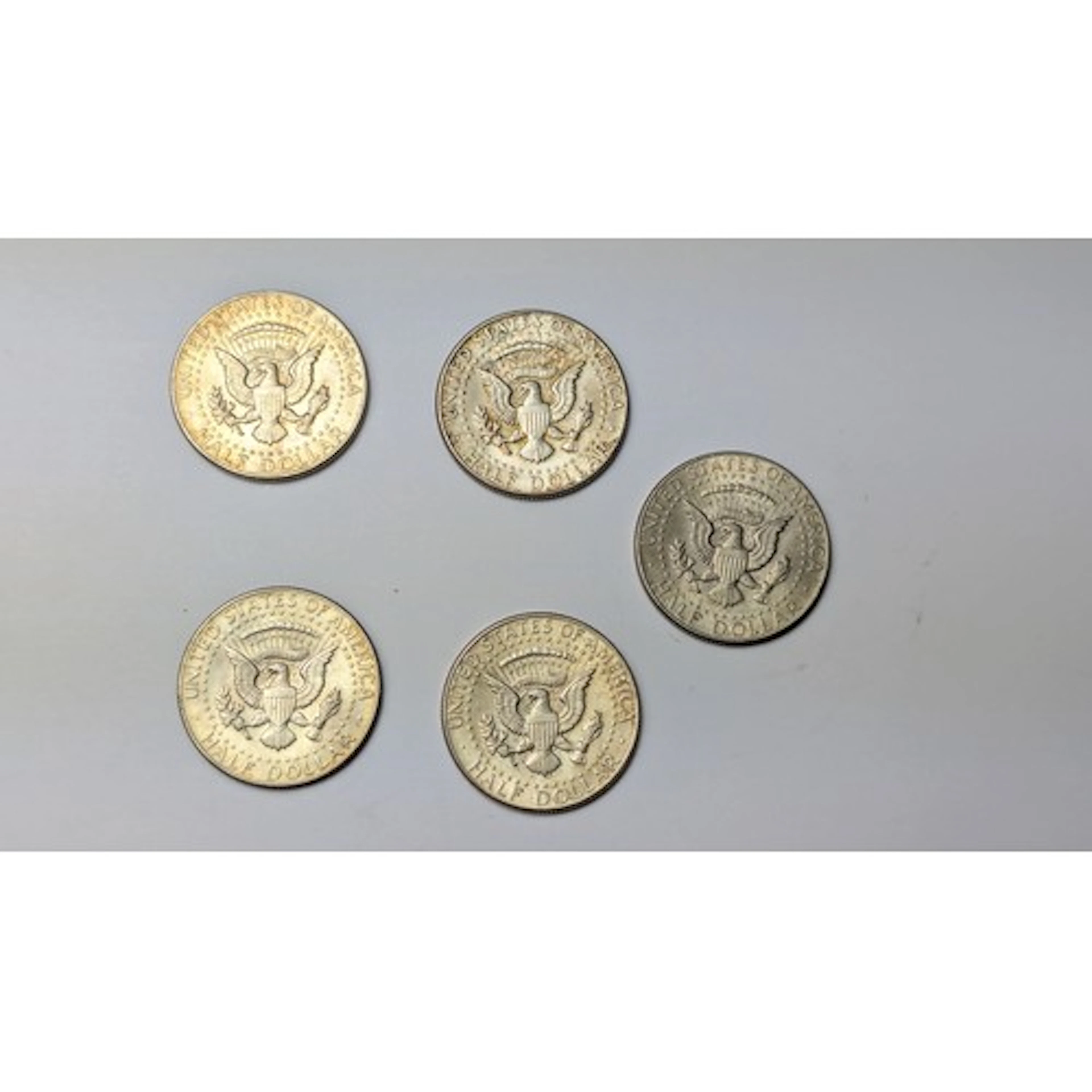 USA five Kennedy half dollars, comprising: four 900-grade si...