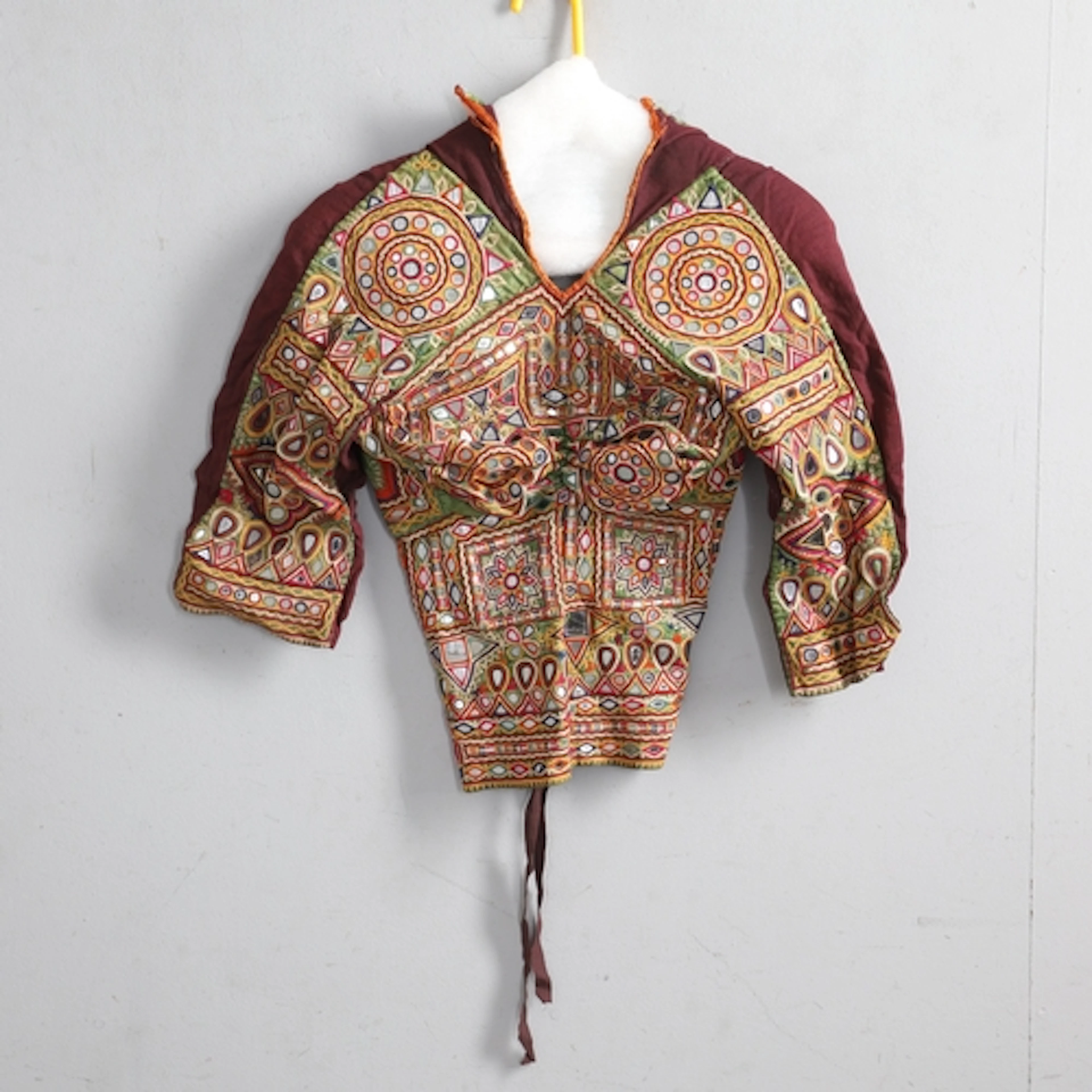 AN EMBROIDERED RABARI CLOLI BLOUSE. late 19th / early 20th c...