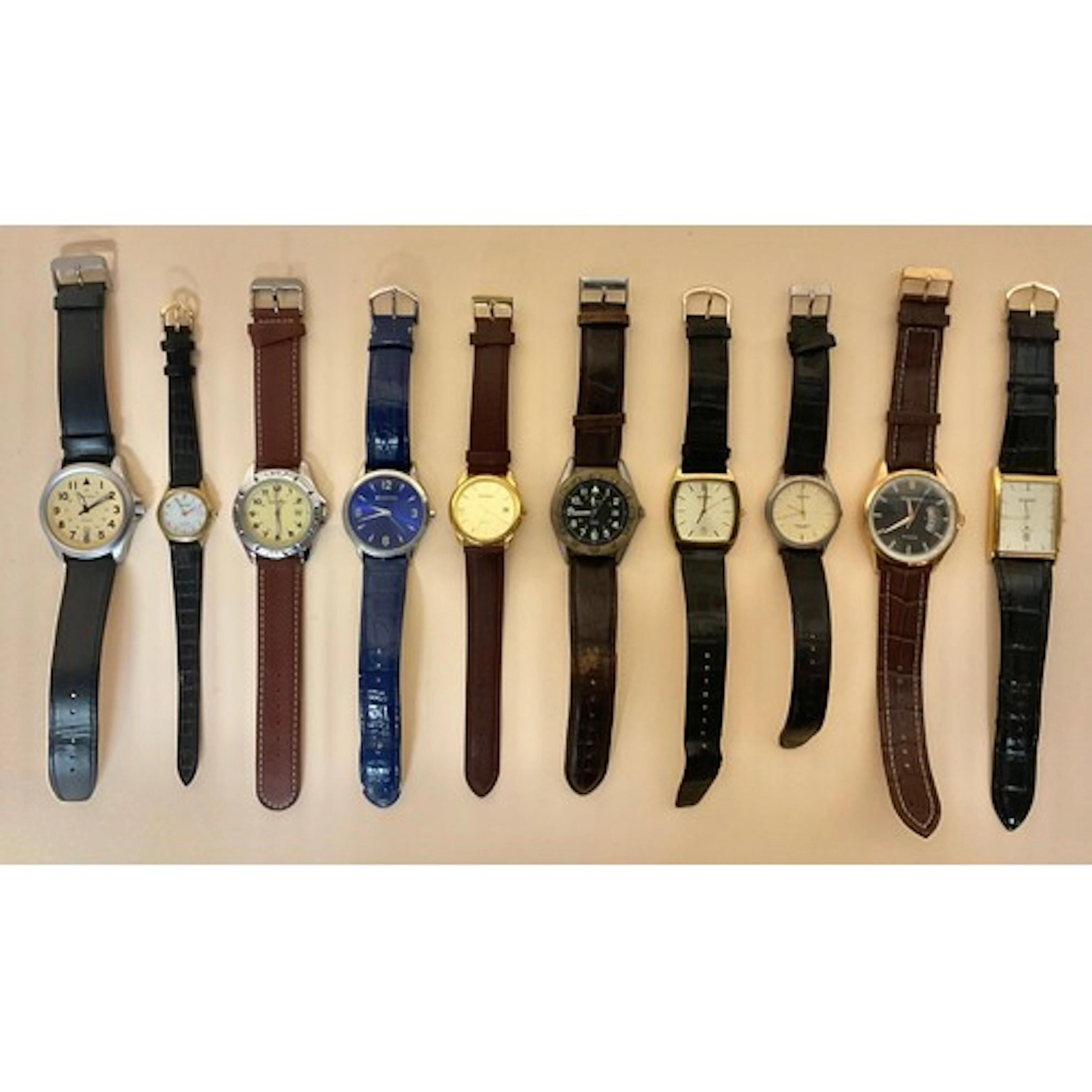 Watches - A collection of ten Sekonda wristwatches on leathe...